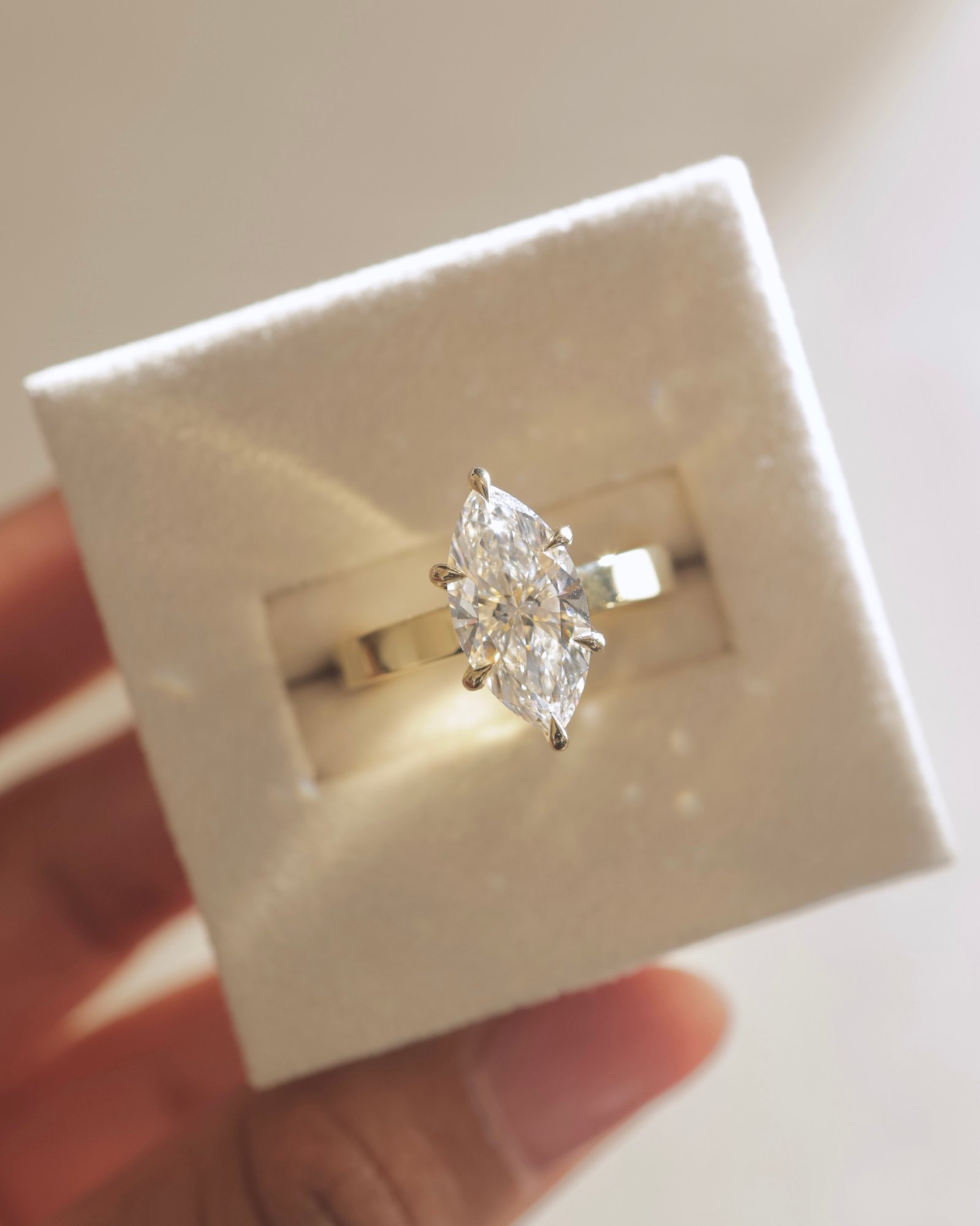 Aisha - Marquise Flat Cigar Band Solitaire with Hidden Halo Lifestyle Image