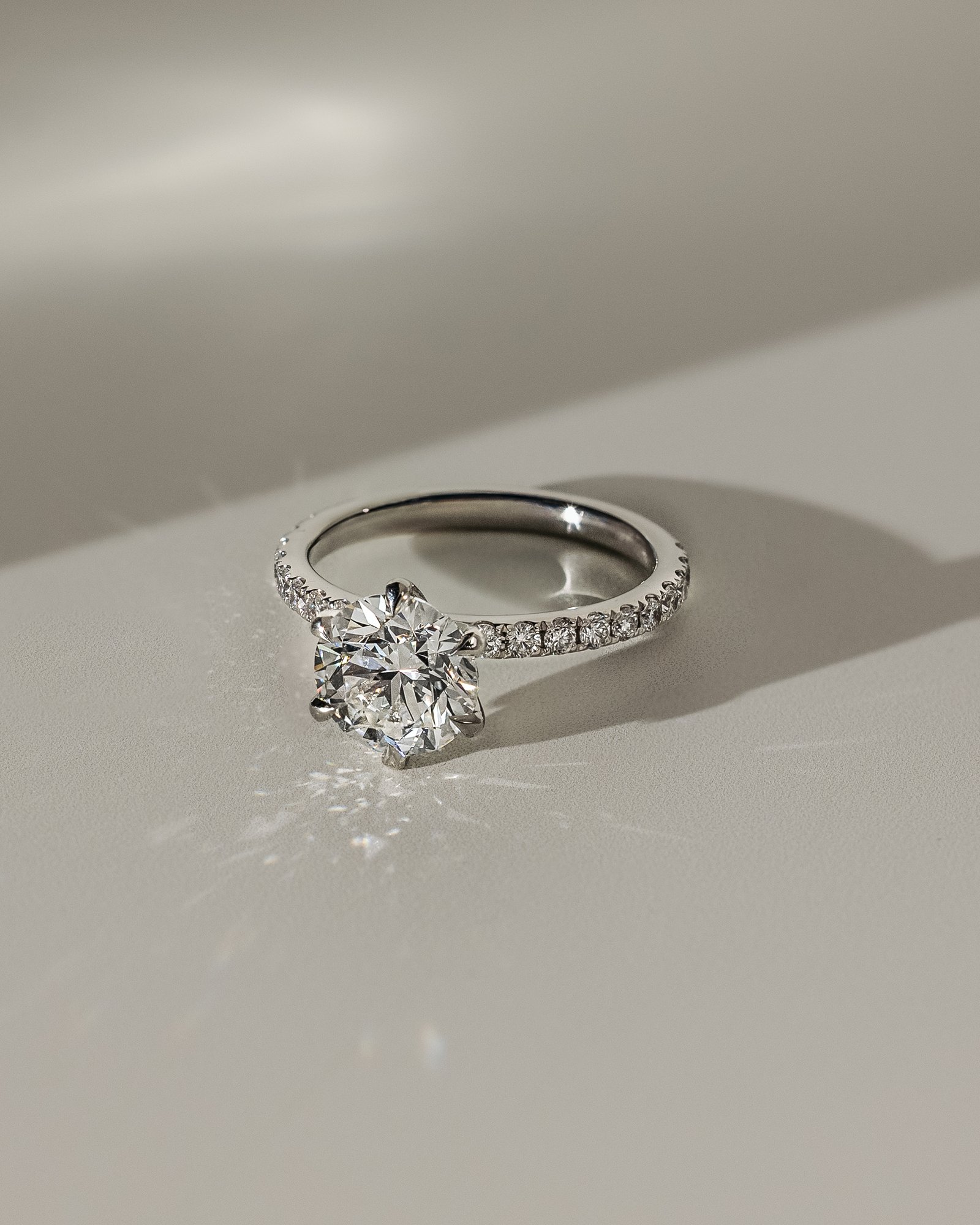 Alexandria  6 Claw Pav Round Solitaire Lifestyle Image