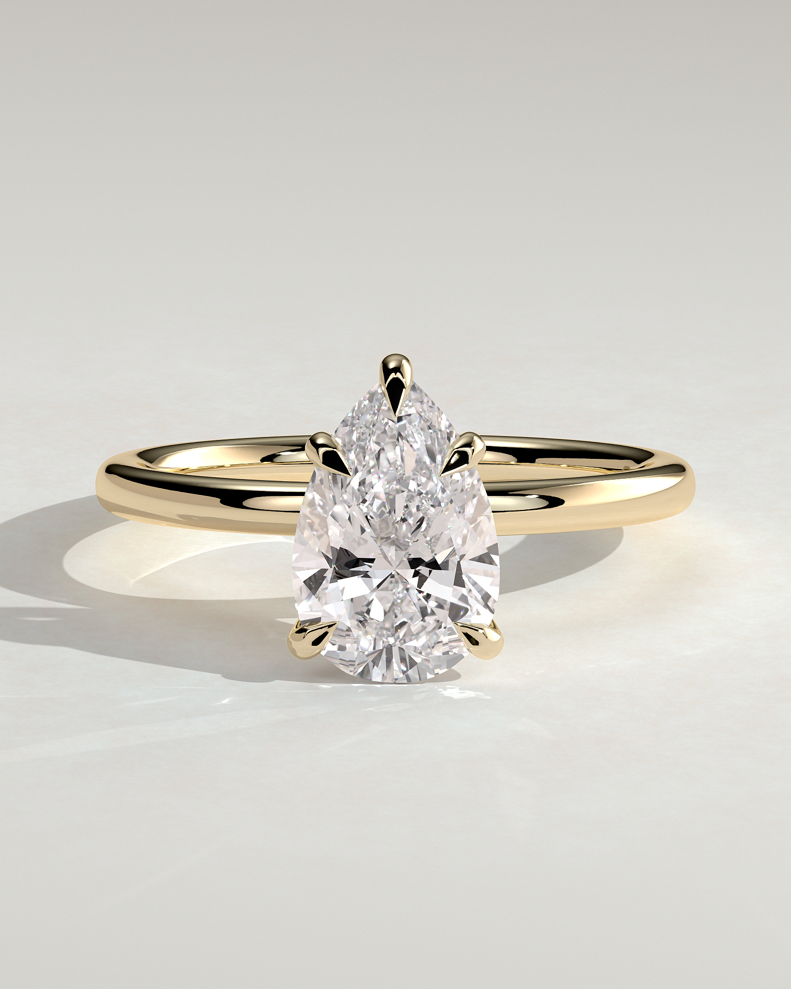 Alia - 5 Claw Pear Solitaire - 18k Yellow Gold