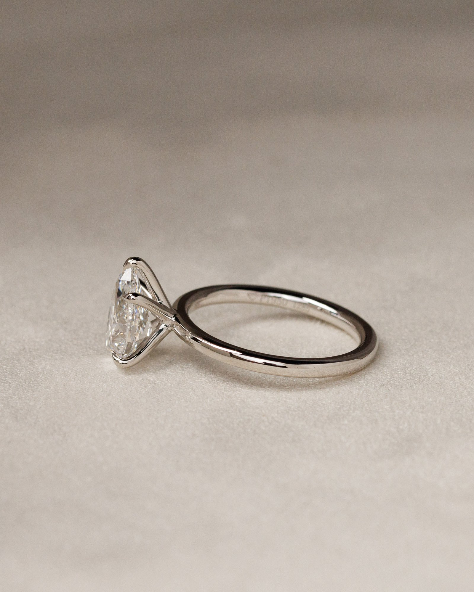 Alia - 5 Claw Pear Solitaire Lifestyle Image