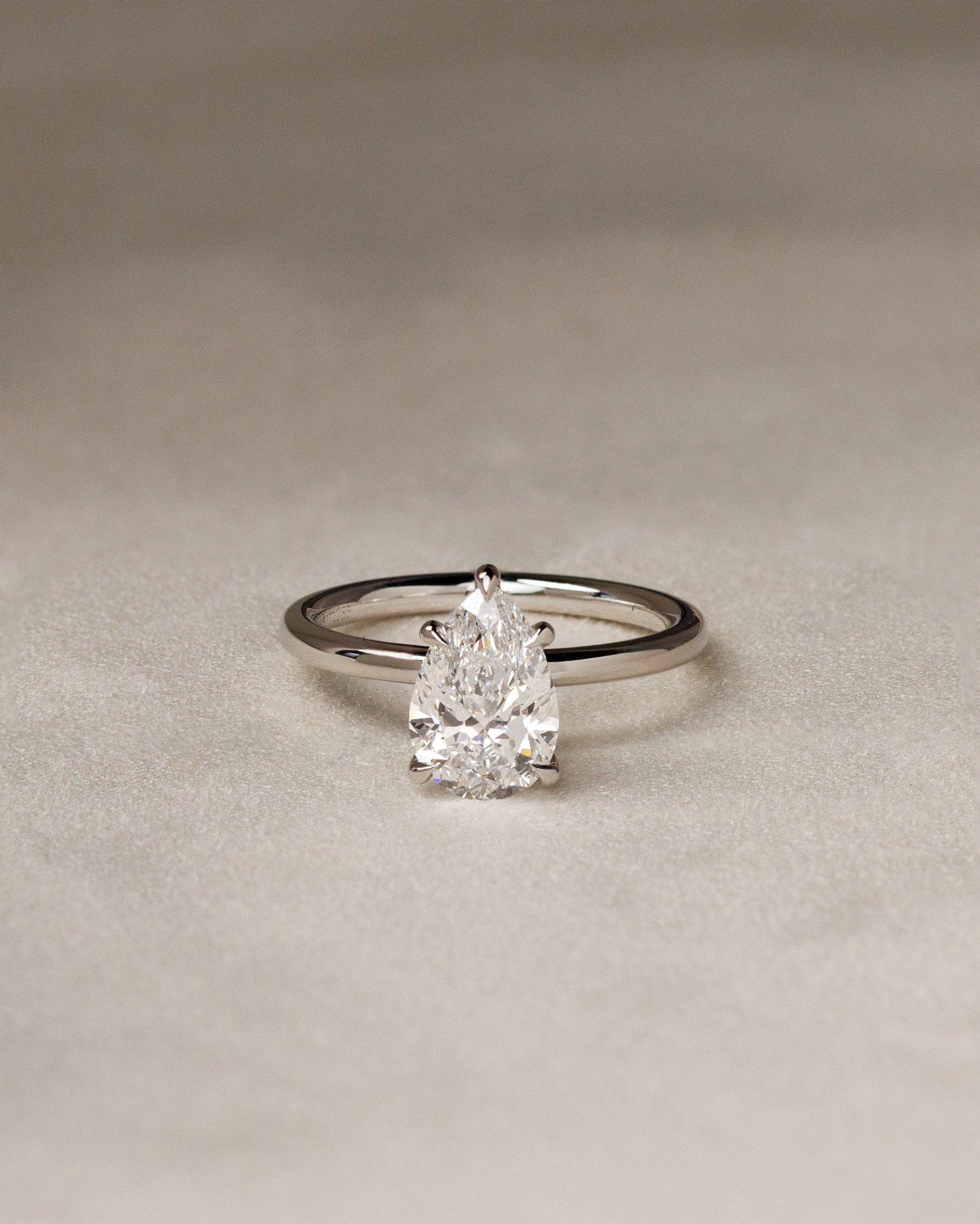 Alia - 5 Claw Pear Solitaire Lifestyle Image