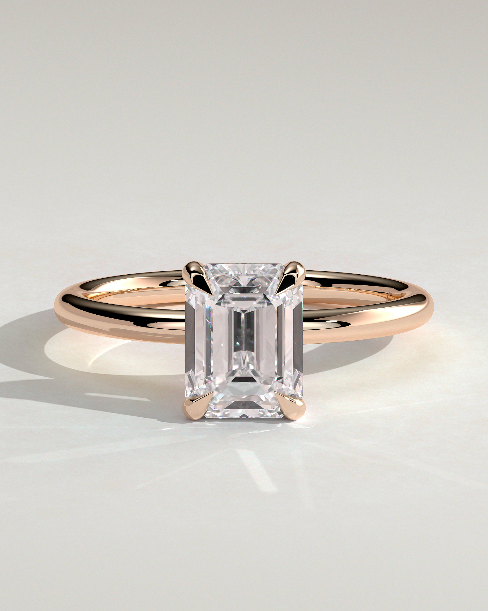 Alina - 4 Claw Emerald Solitaire - 18k Rose Gold High Setting