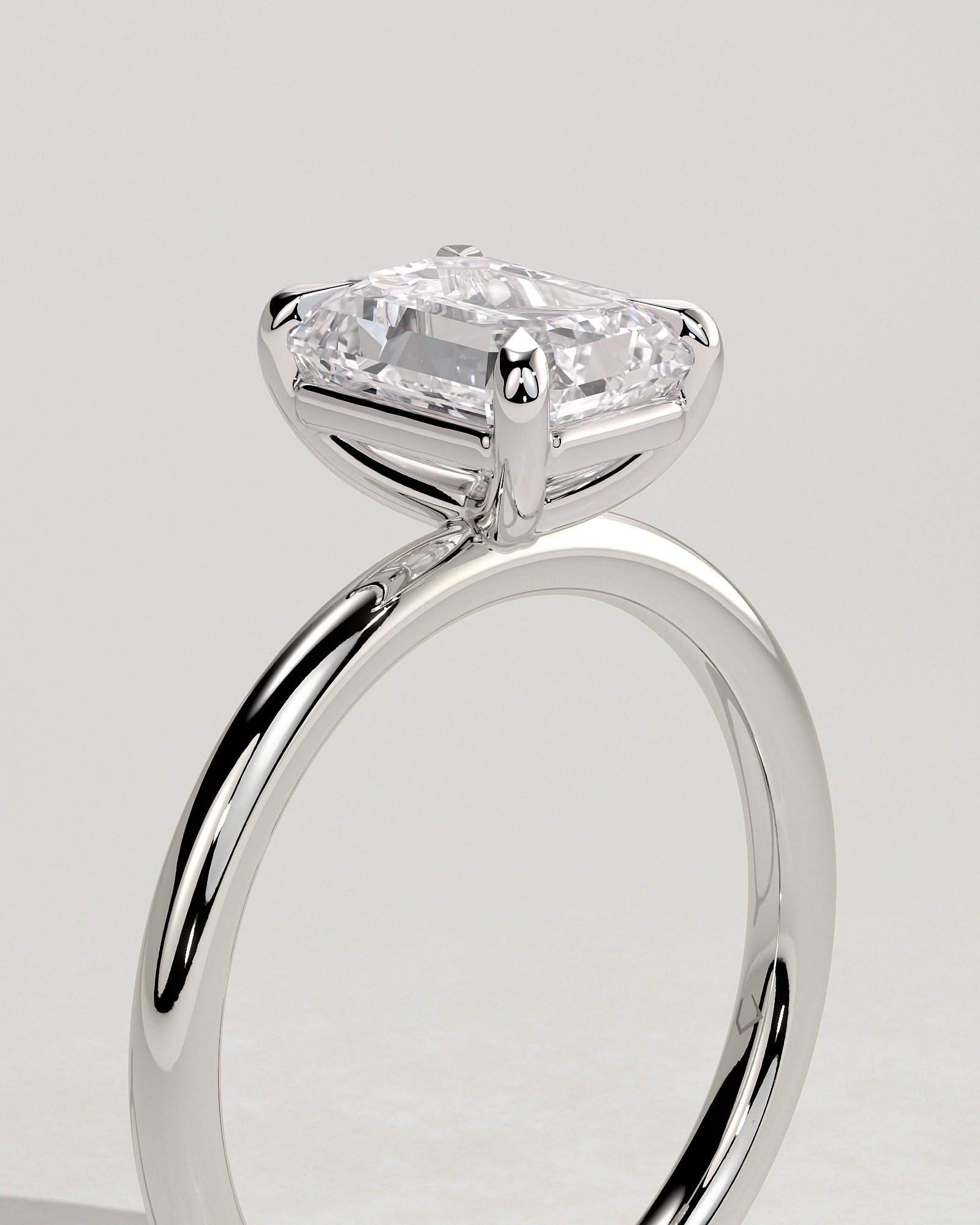 Alina - 4 Claw Emerald Solitaire - 18k White Gold High Setting
