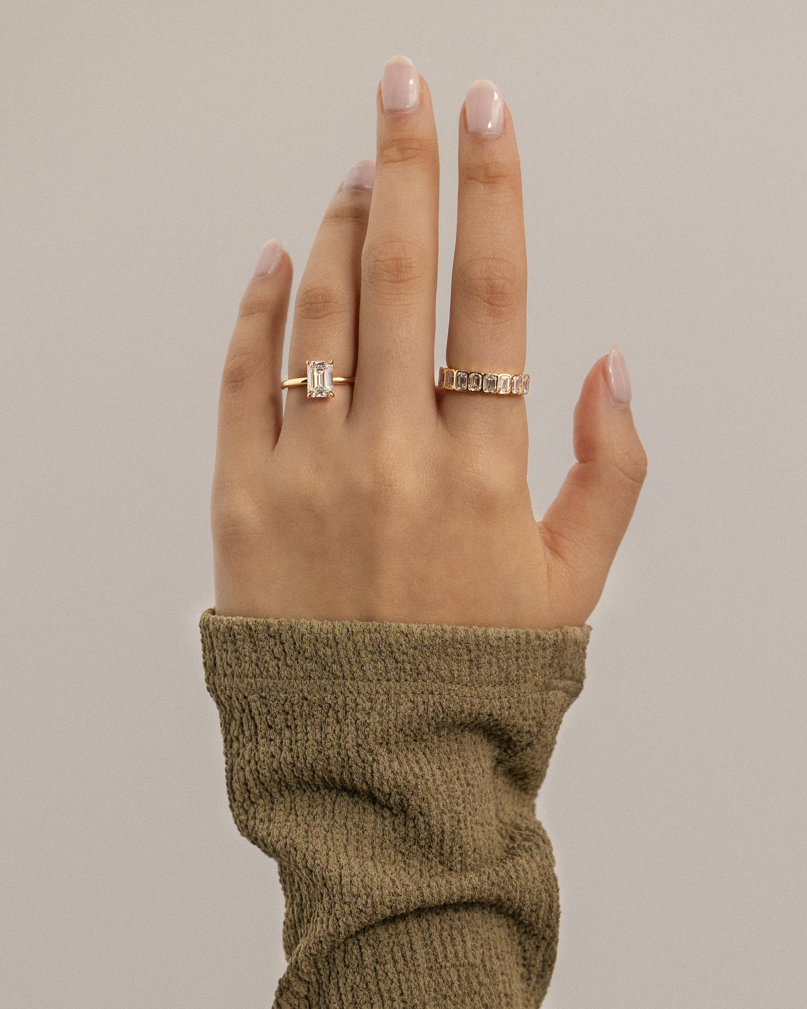 Alina - 4 Claw Emerald Solitaire Lifestyle Image