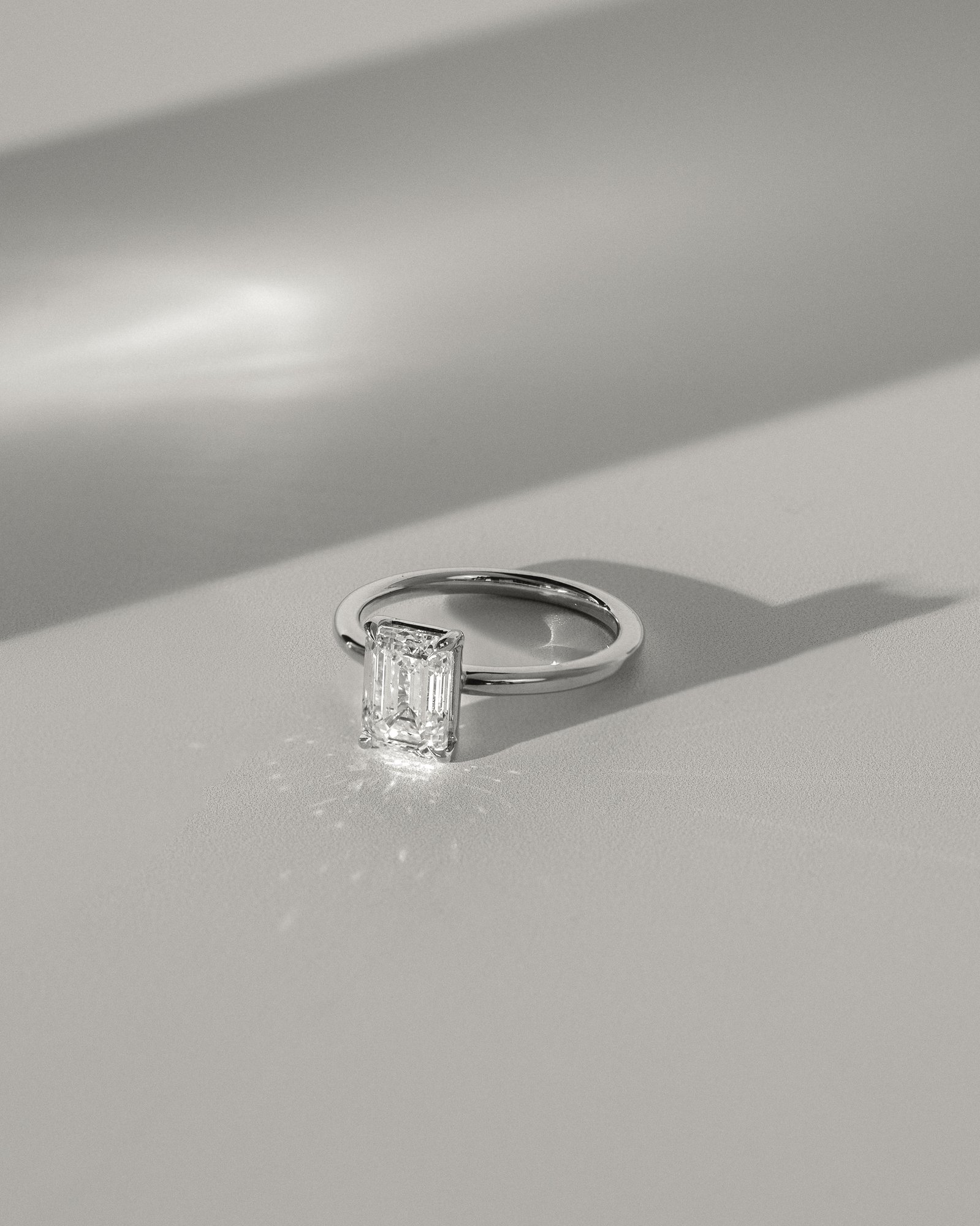 Alina - 4 Claw Emerald Solitaire Lifestyle Image