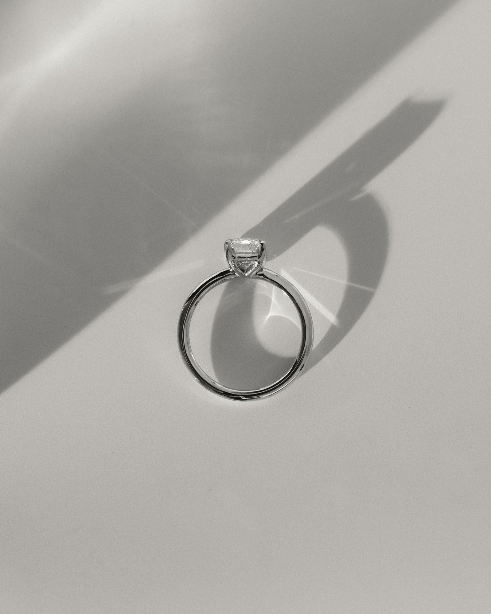 Alina - 4 Claw Emerald Solitaire Lifestyle Image