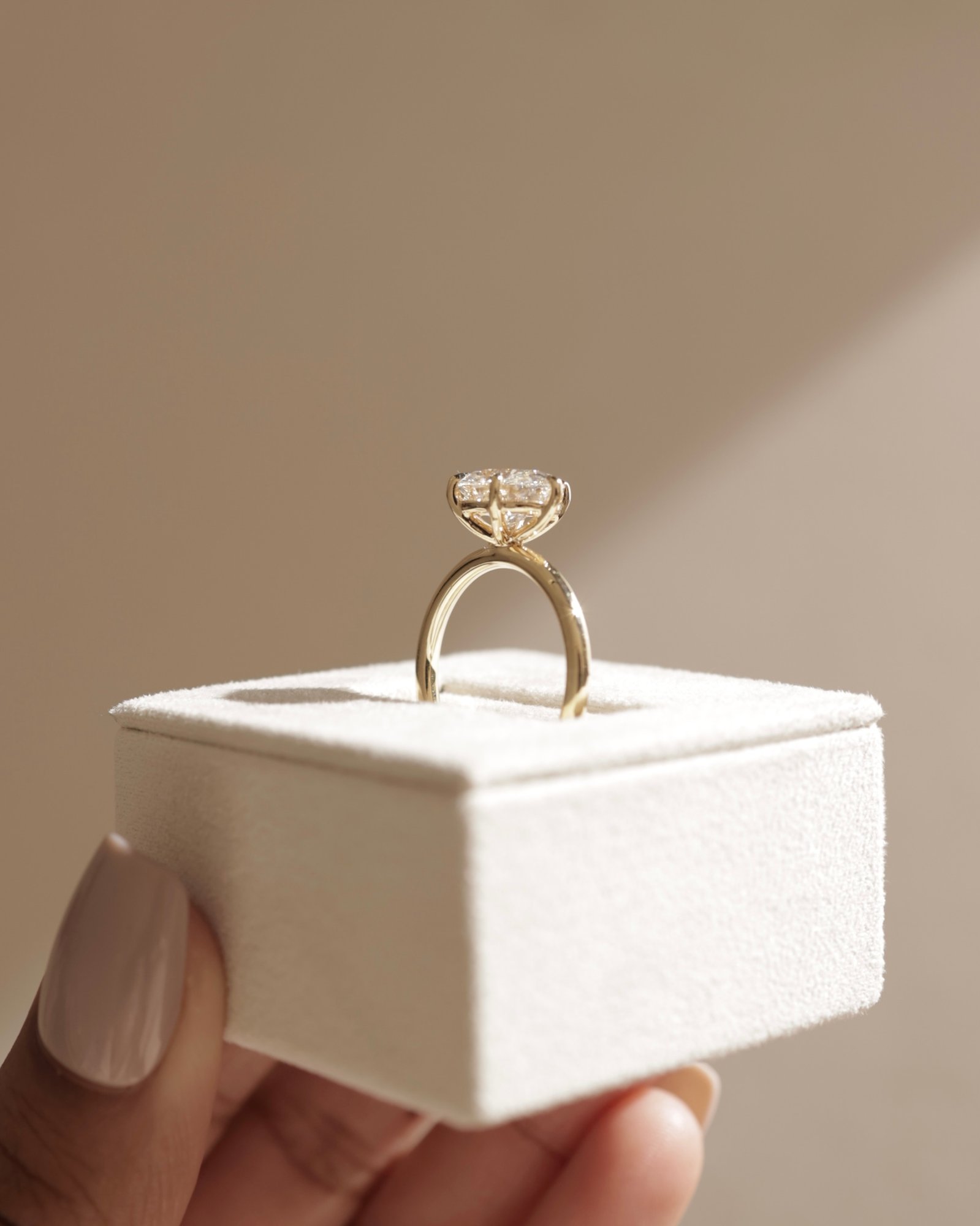 Allison - Oval East-West Solitaire Lifestyle Image