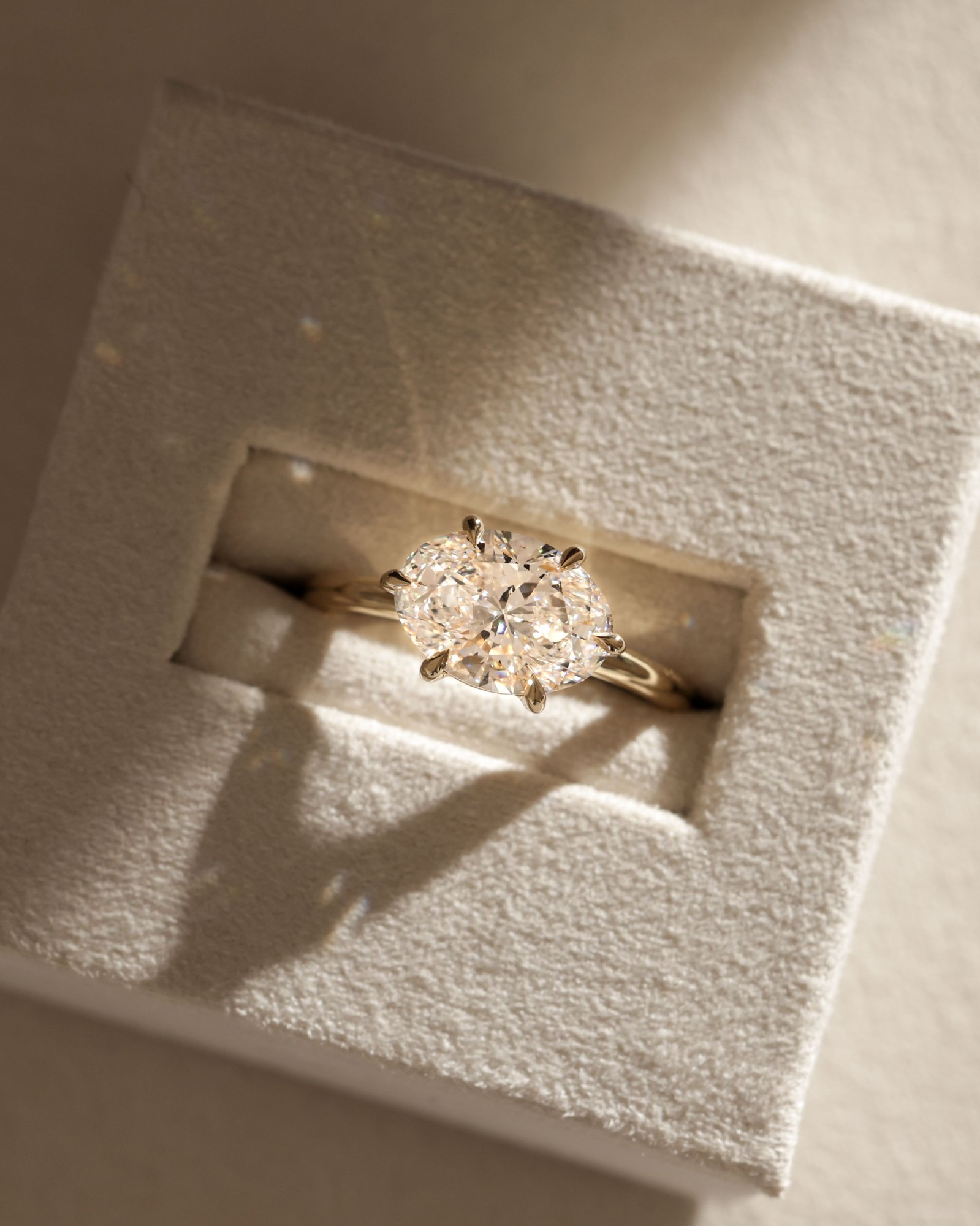 Allison - Oval East-West Solitaire Lifestyle Image