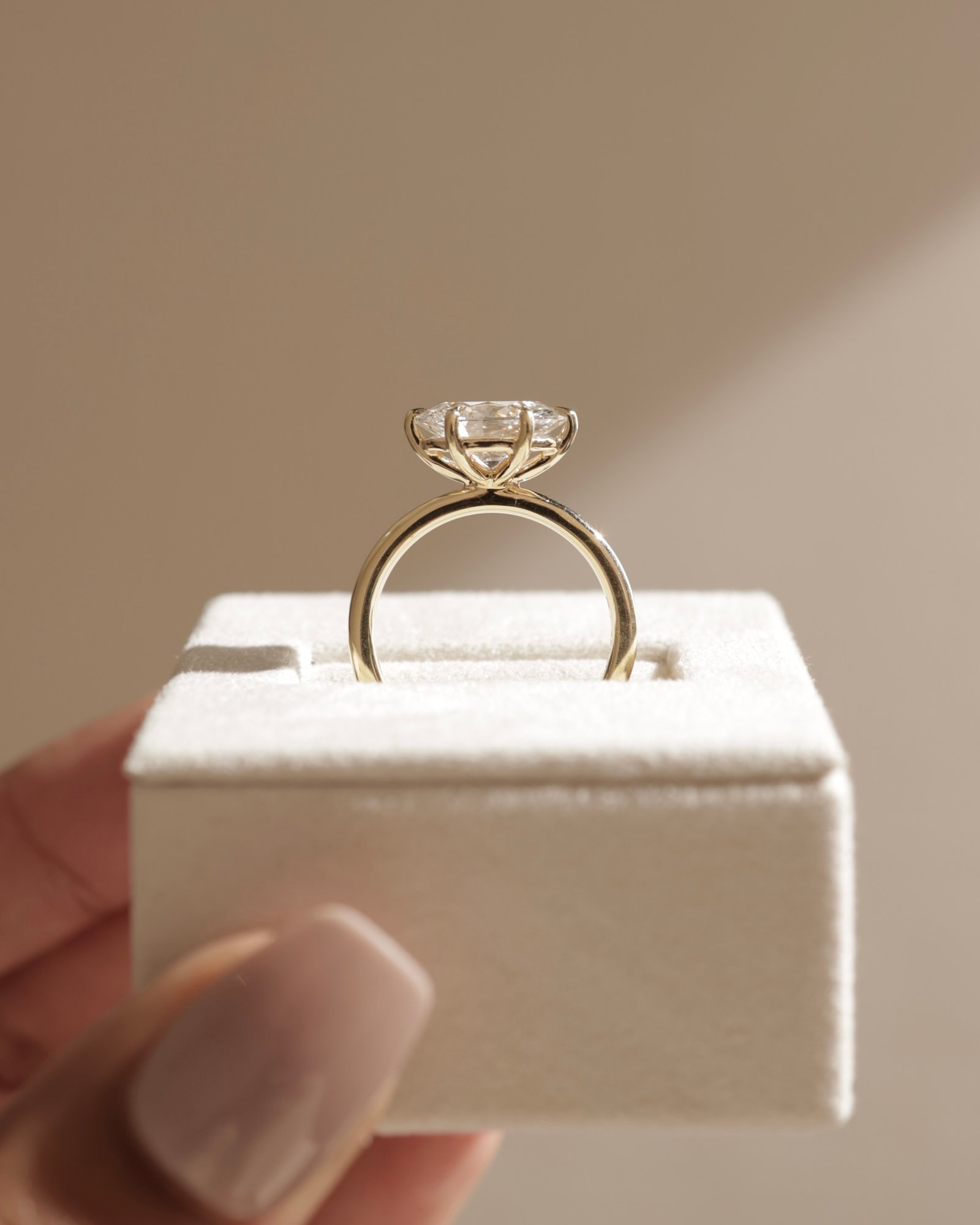 Allison - Oval East-West Solitaire Lifestyle Image