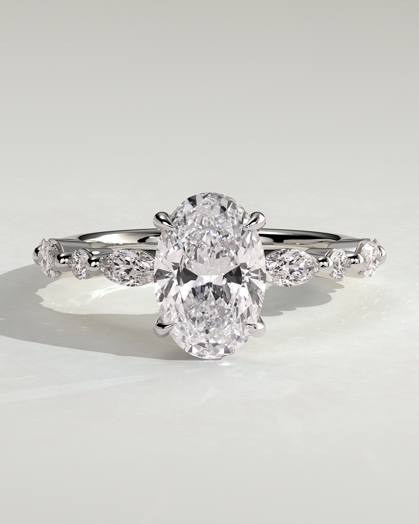 Alyssa  Oval Solitaire with Accent Stones - 18k White Gold