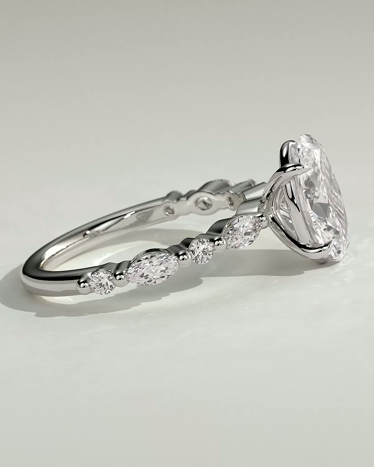 Alyssa  Oval Solitaire with Accent Stones - 18k White Gold