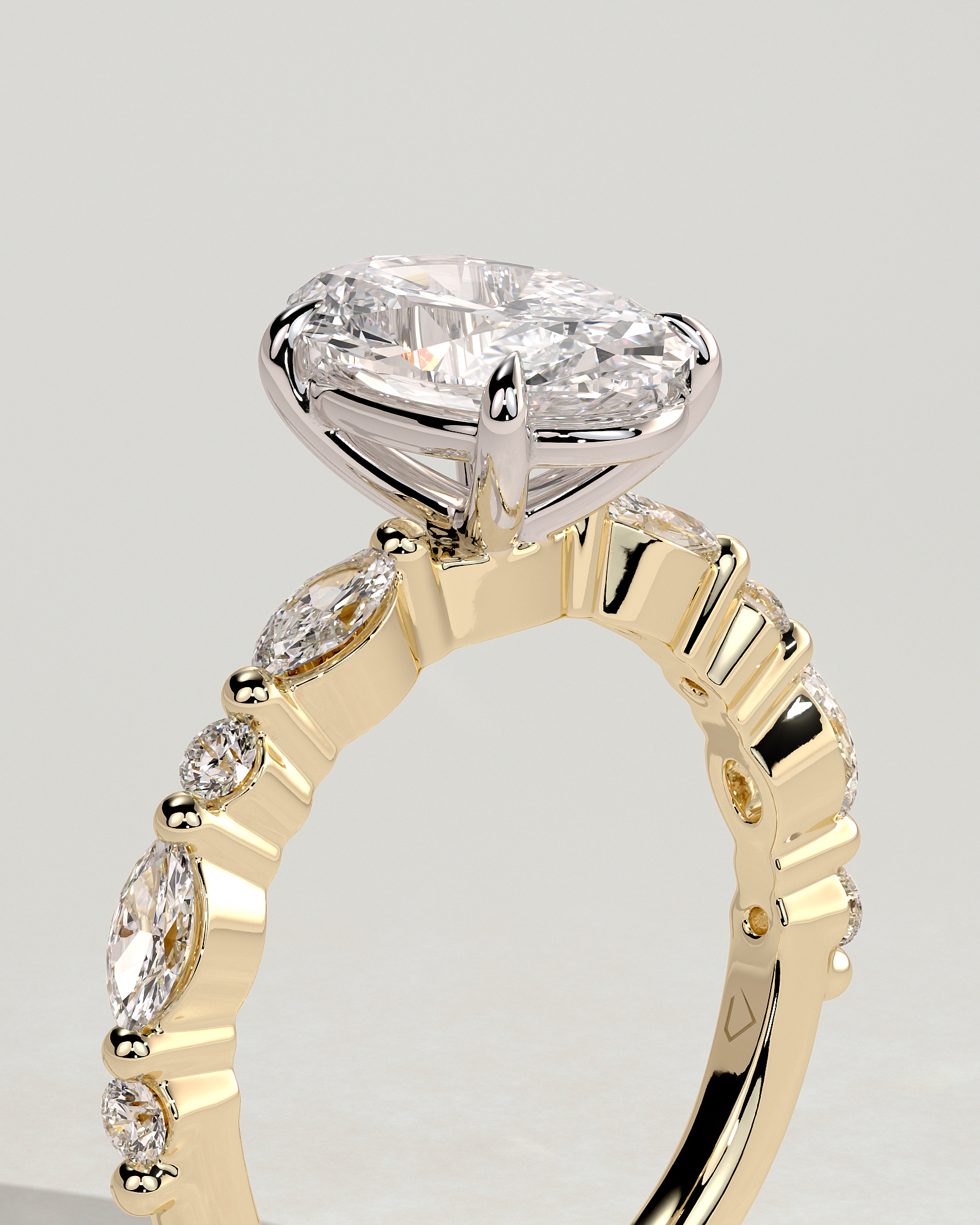 Alyssa - Oval 4 Claw Solitaire with Marquise and Round Accent Stones Engagement Ring - 18k Yellow Gold / 18k White Gold