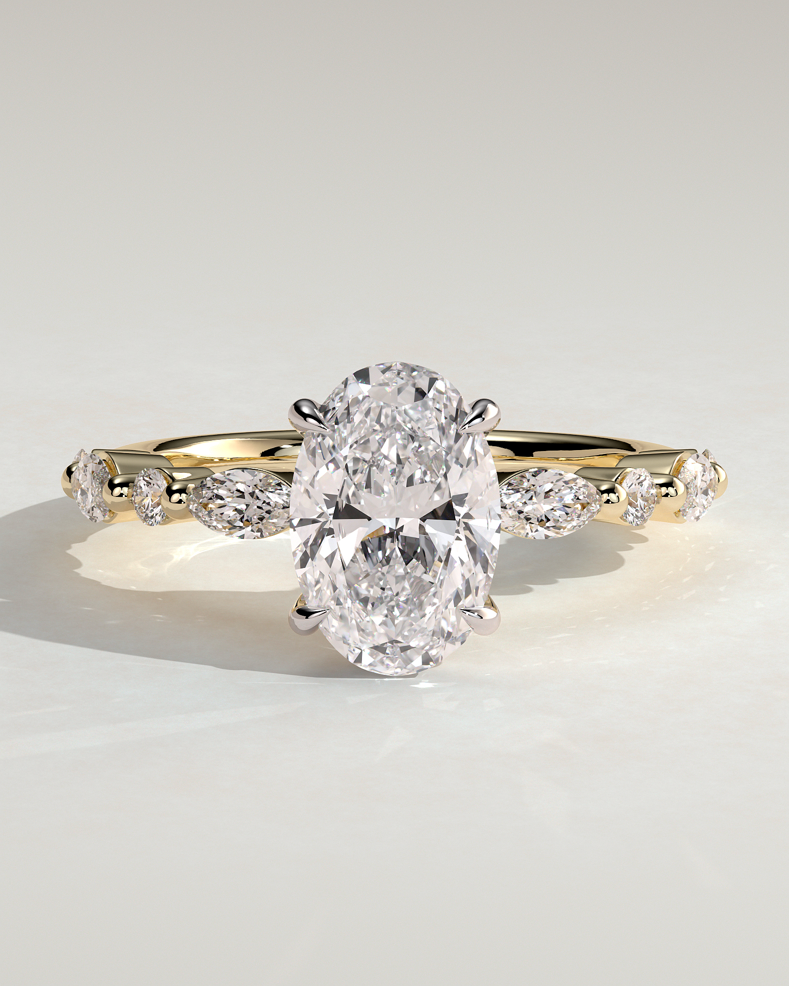 Alyssa  Oval Solitaire with Accent Stones - 18k Yellow Gold / 18k White Gold