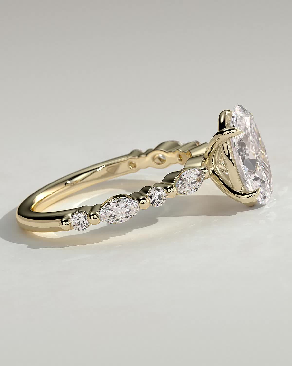 Alyssa - Oval 4 Claw Solitaire with Marquise and Round Accent Stones Engagement Ring - 18k Yellow Gold