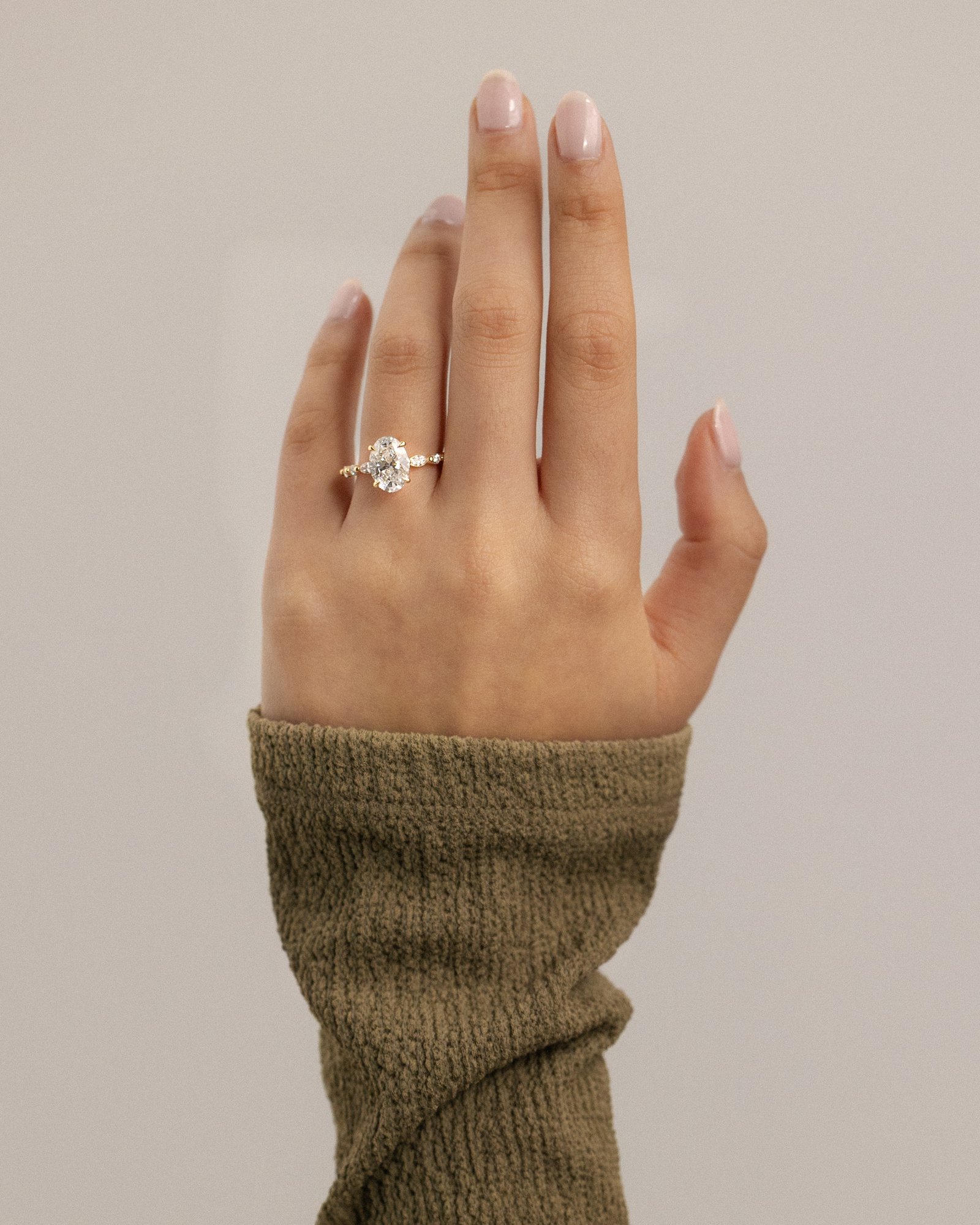 Alyssa  Oval Solitaire with Accent Stones Lifestyle Image