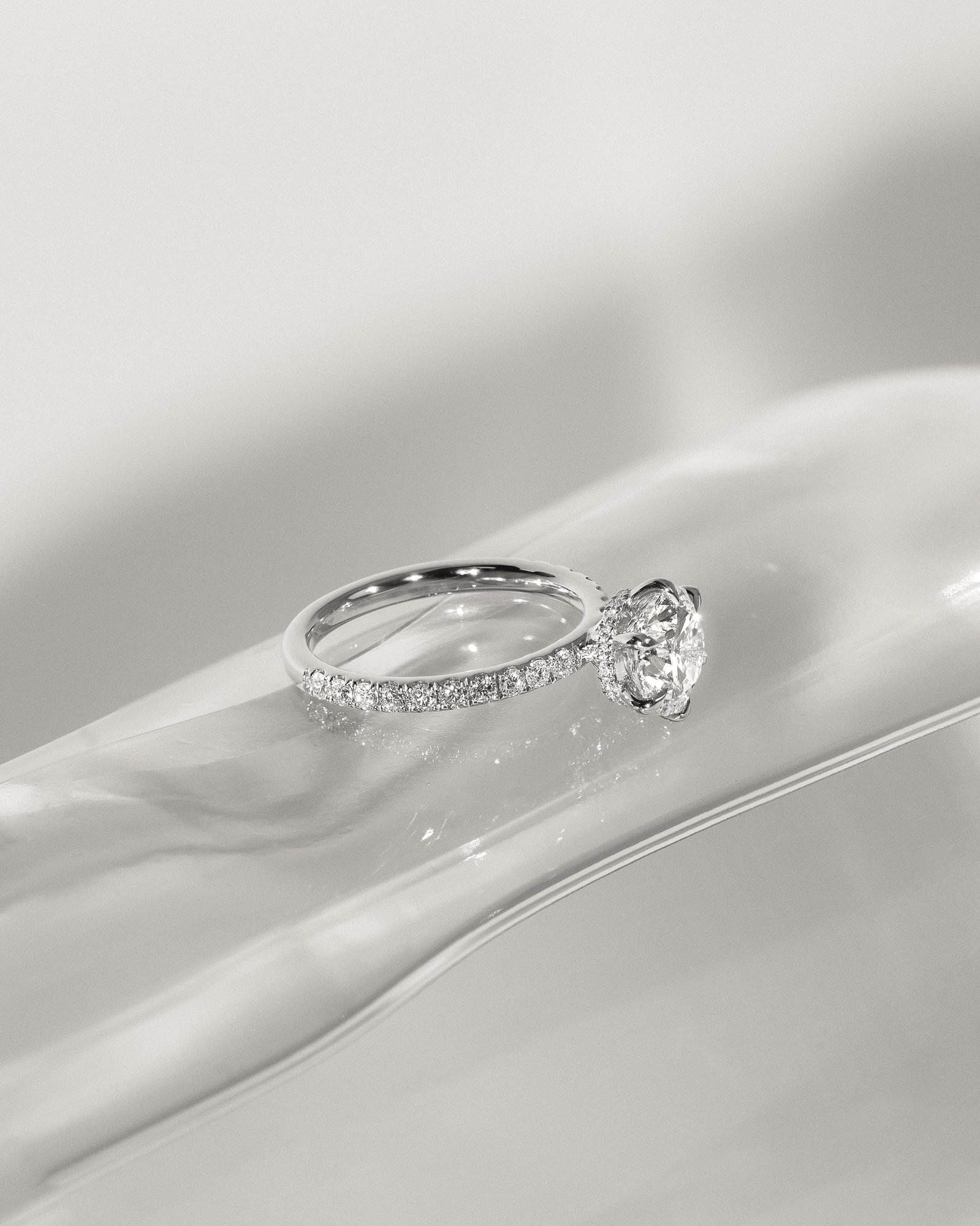 Amanda - 6 Claw Pav Round Solitaire with Hidden Halo Lifestyle Image