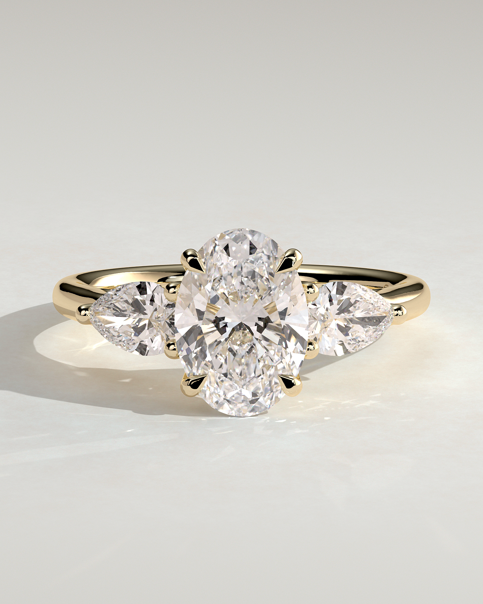 Amara - Trellis Set Oval Trilogy - 18k Yellow Gold