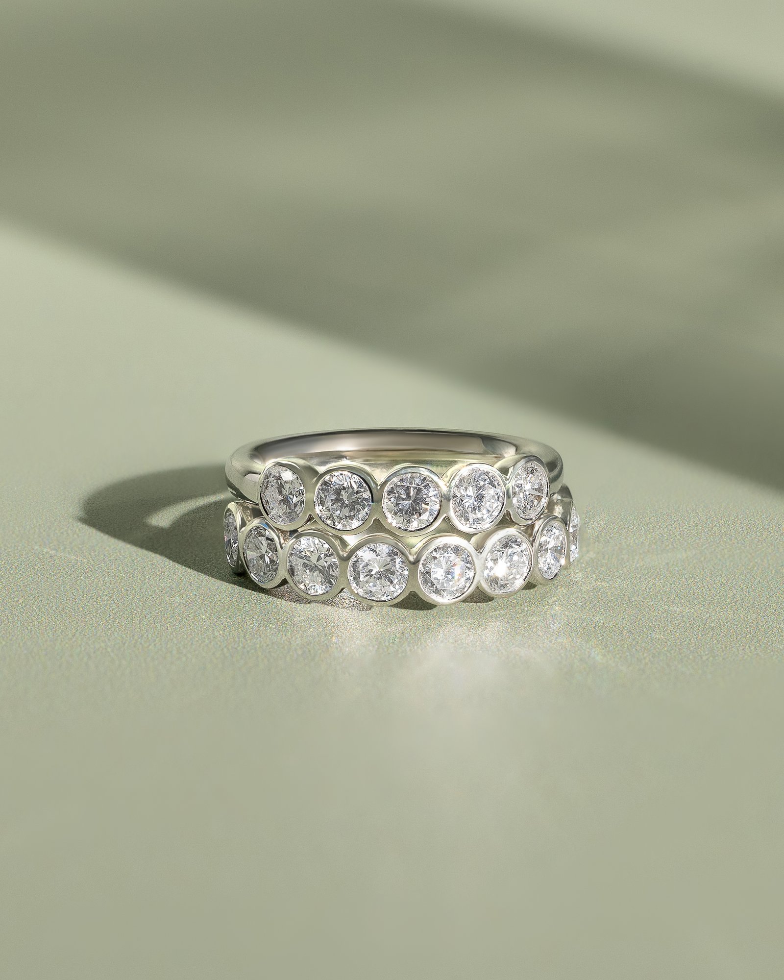 Amber - Bezel Set Round Wedding Ring Lifestyle Image