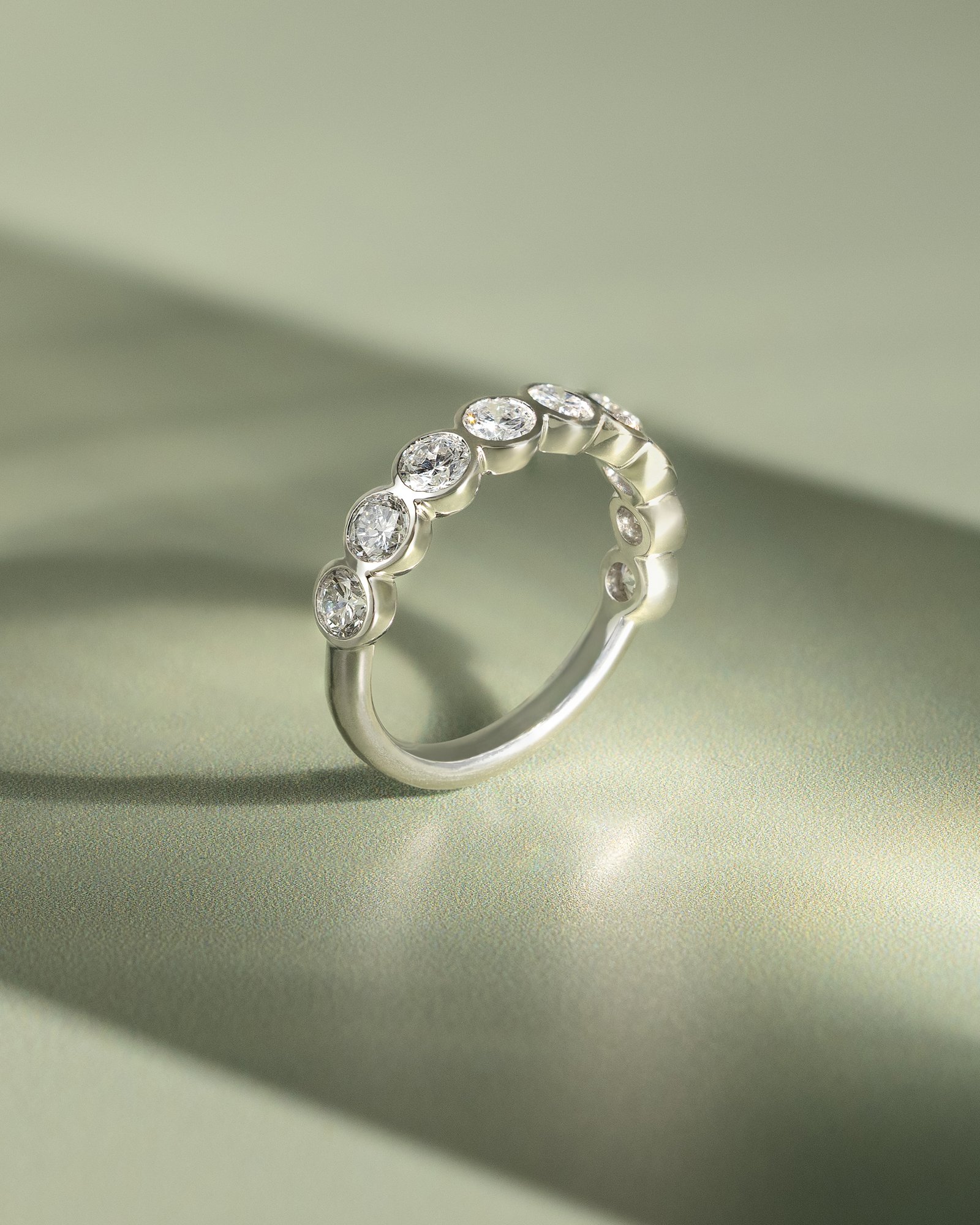 Amber - Bezel Set Round Wedding Ring Lifestyle Image