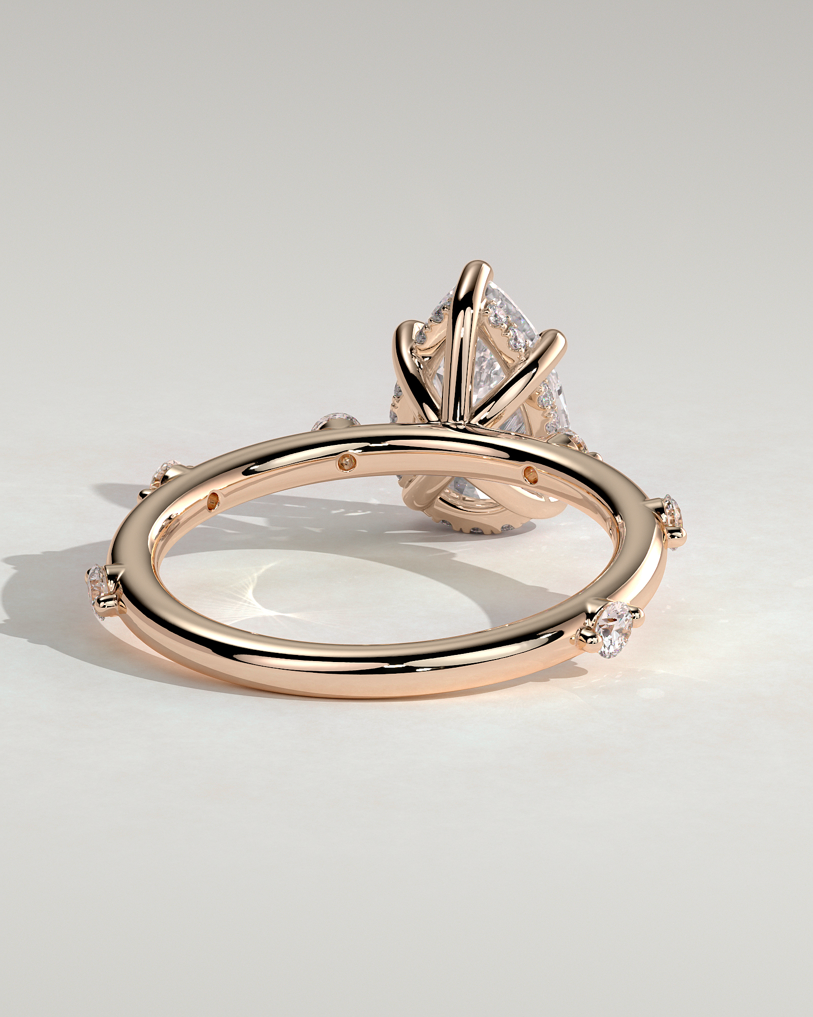 Amora - Pear Solitaire with Round Side Stones - 18k Rose Gold