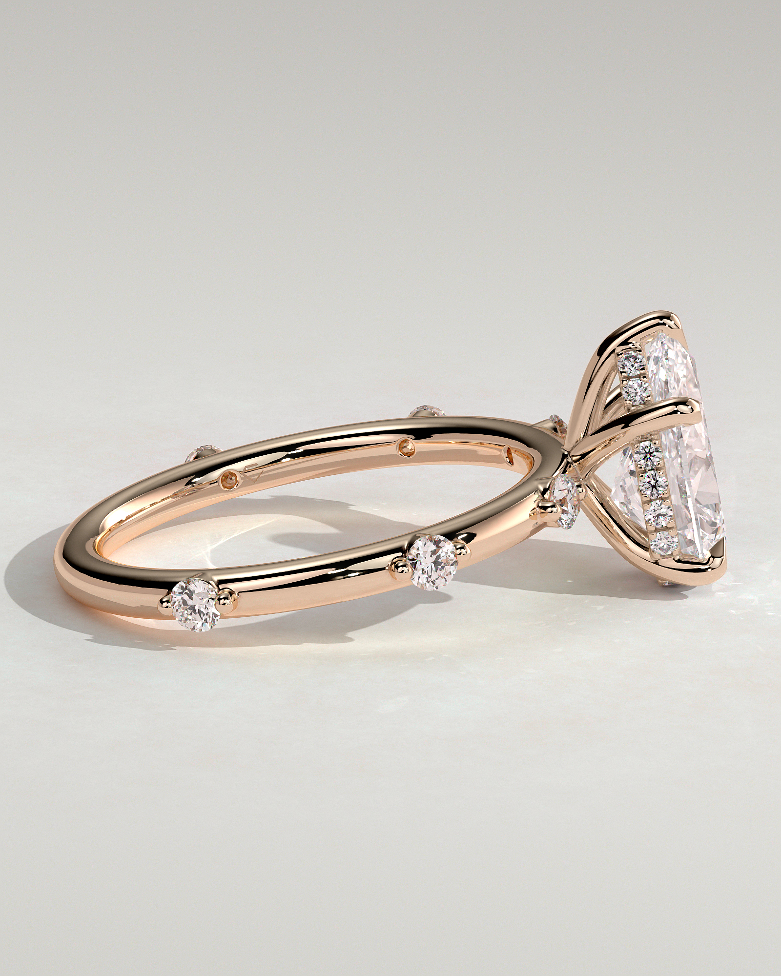Amora - Pear Solitaire with Round Side Stones - 18k Rose Gold