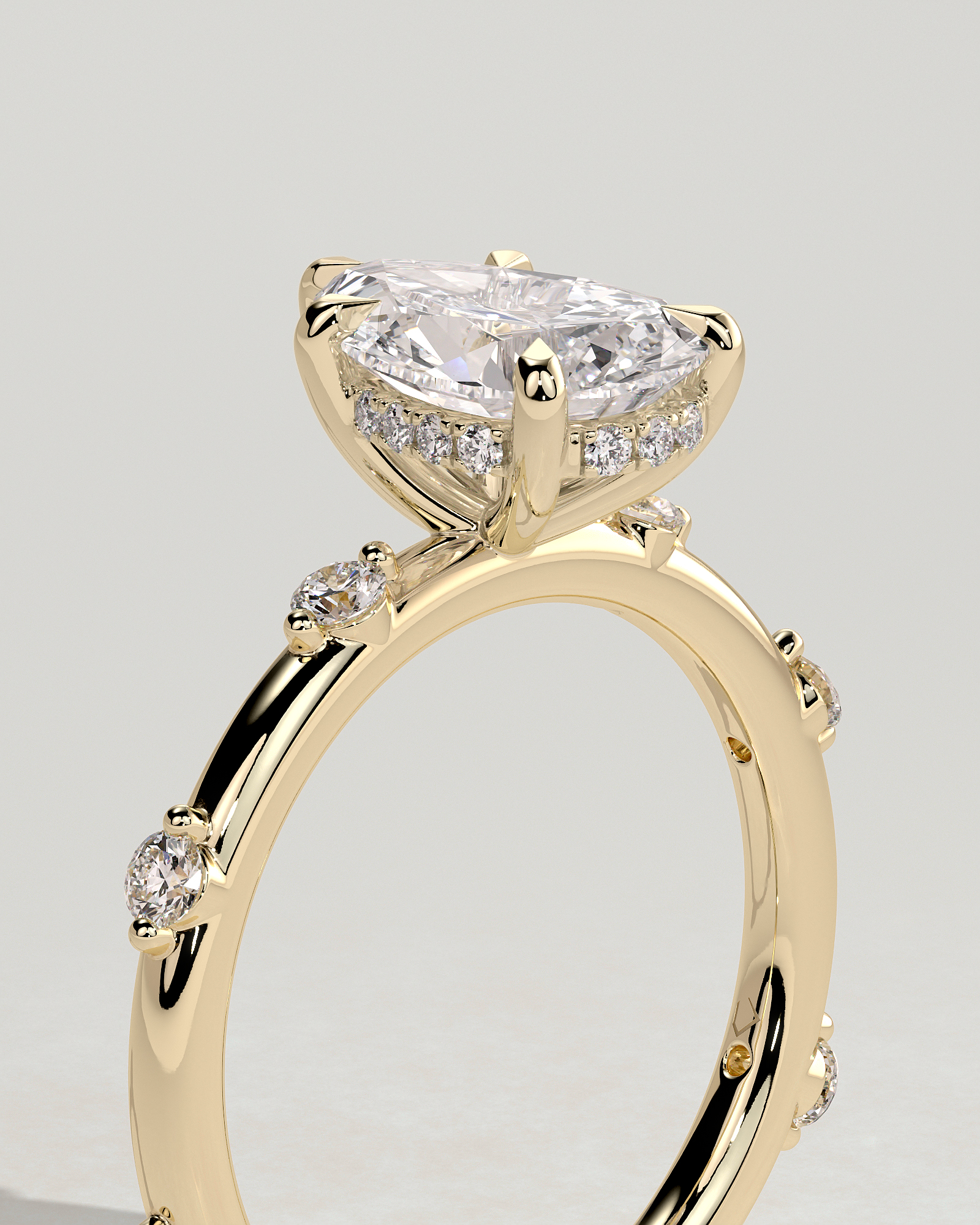 Amora - Pear Solitaire with Round Side Stones - 18k Yellow Gold