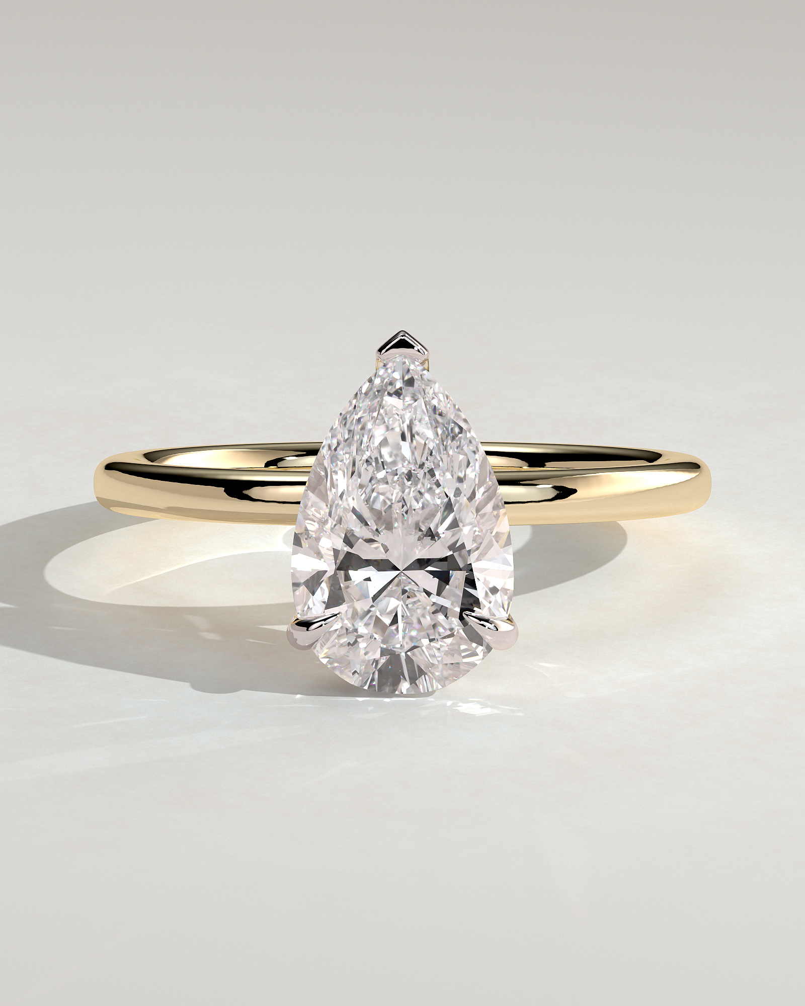 Amy  3 Claw Pear Solitaire - 18k Yellow Gold / 18k White Gold V Claw