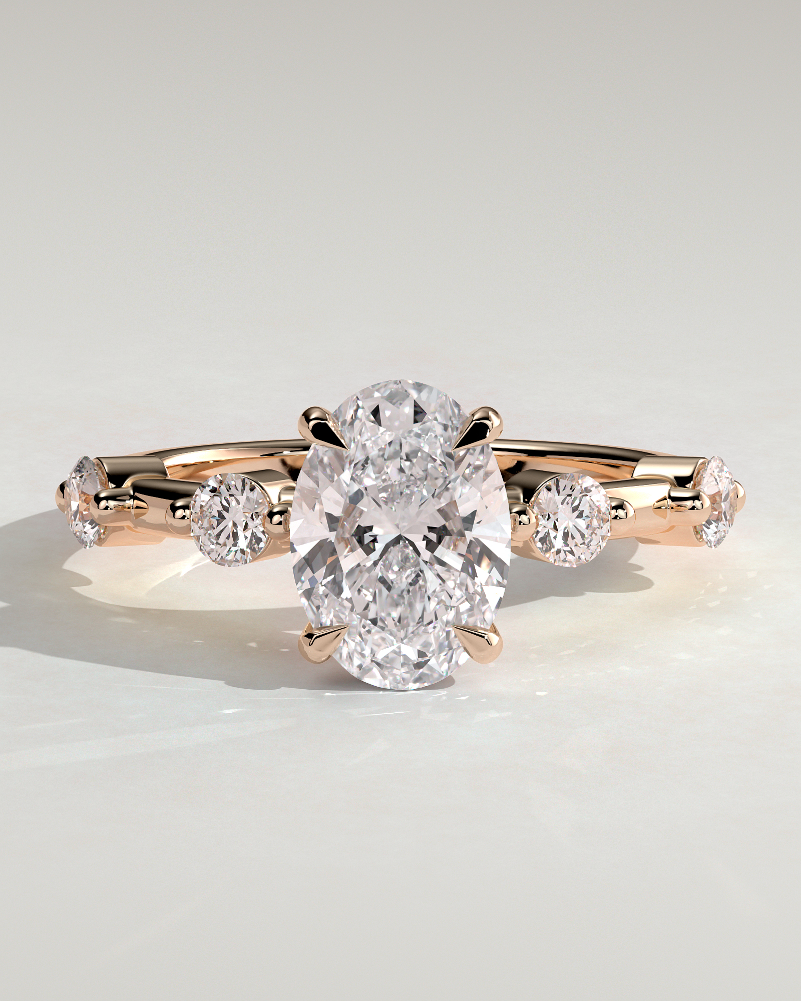 Arwen - Oval Solitaire with Hidden Halo and Accent Stones - 18k Rose Gold