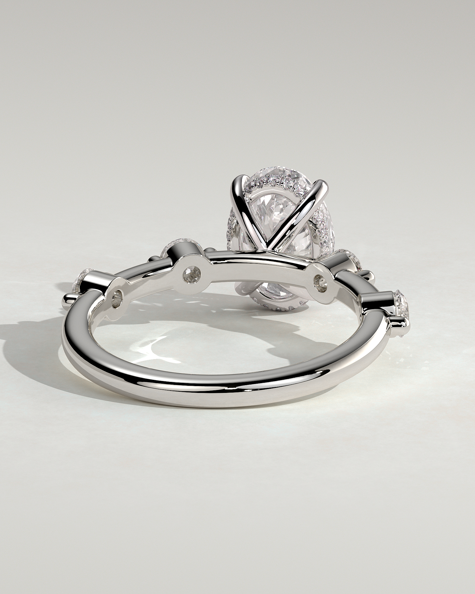 Arwen - Oval Solitaire with Hidden Halo and Accent Stones - 18k White Gold