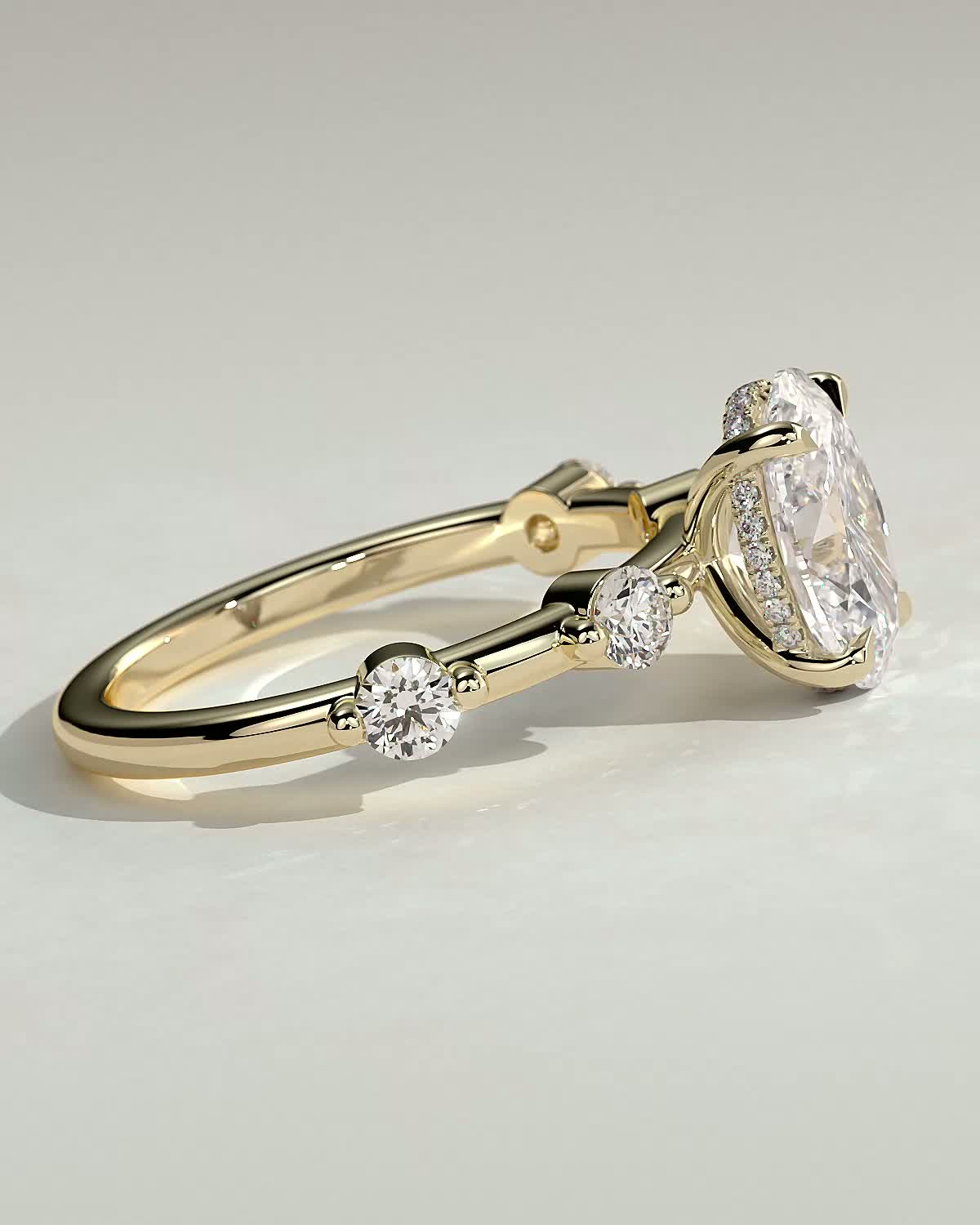 Arwen - Oval Solitaire with Hidden Halo and Accent Stones - 18k Yellow Gold