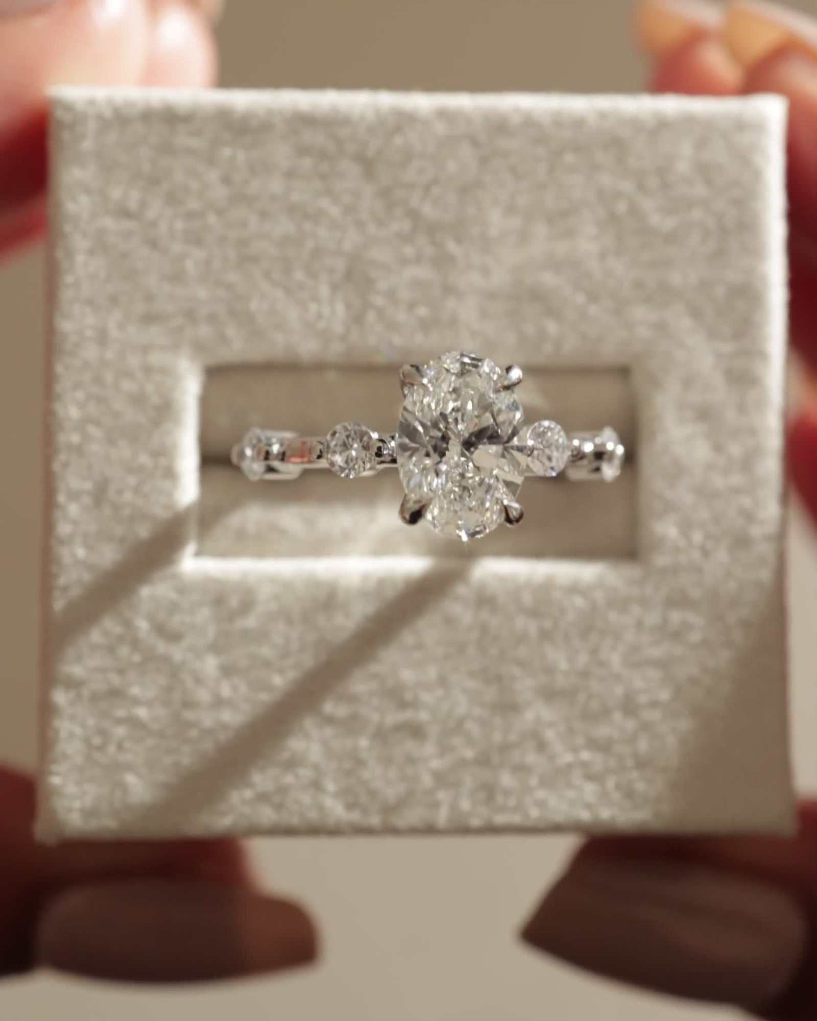 Arwen - Oval Solitaire with Hidden Halo and Accent Stones Lifestyle Image