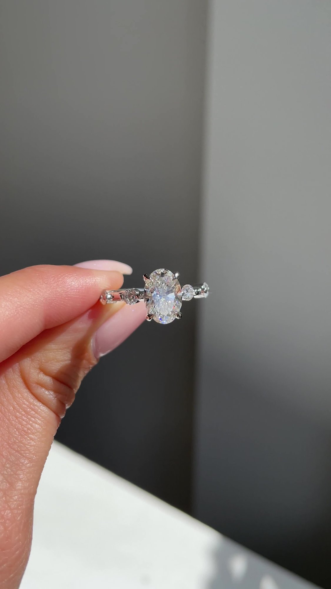 Arwen - Oval Solitaire with Hidden Halo and Accent Stones Lifestyle Image