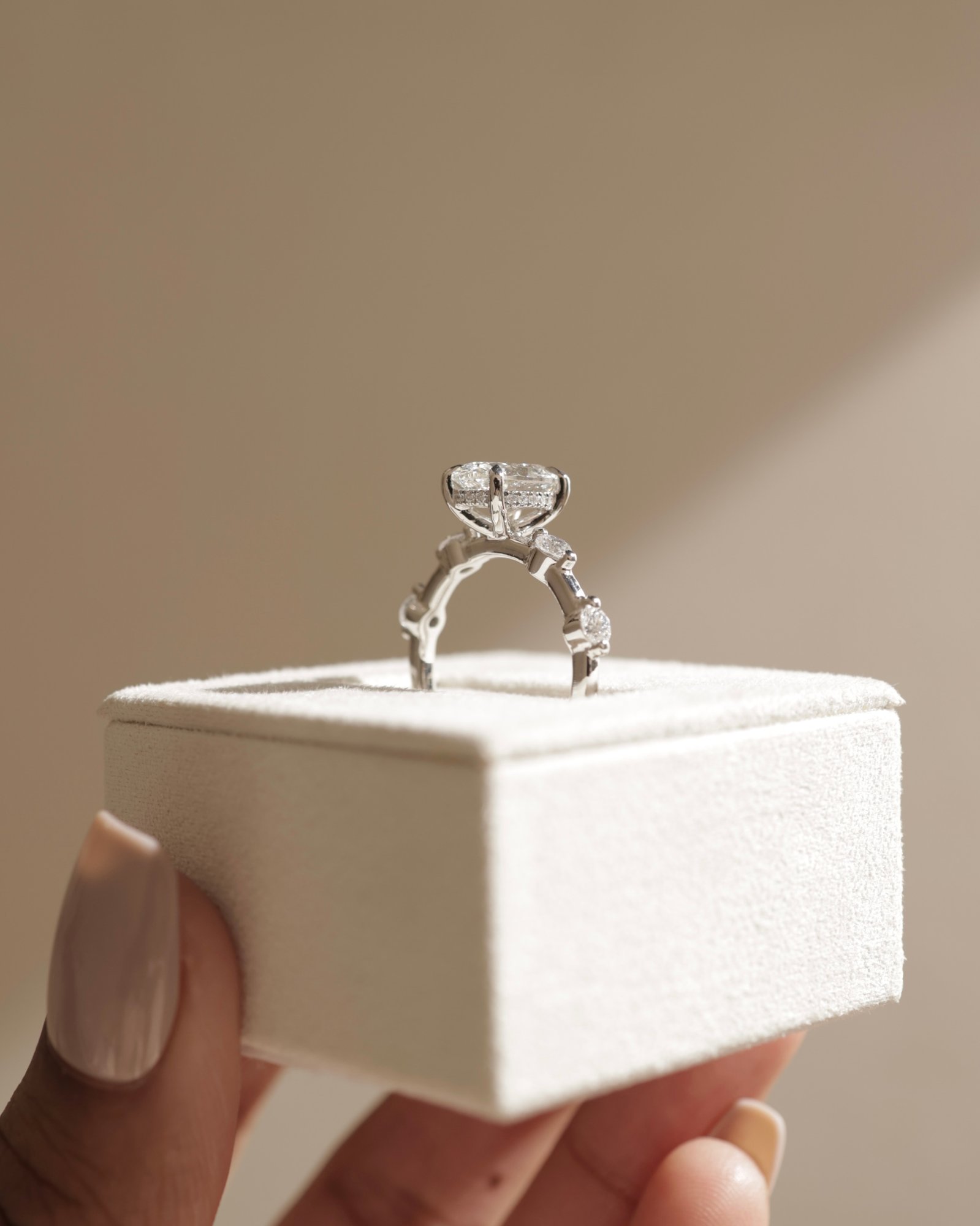 Arwen - Oval Solitaire with Hidden Halo and Accent Stones Lifestyle Image