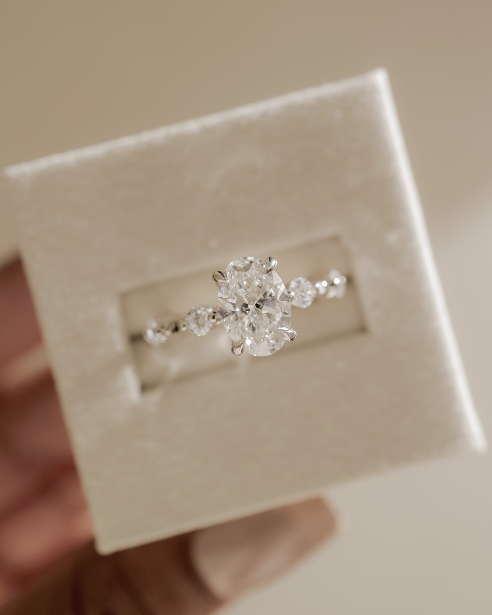 Arwen - Oval Solitaire with Hidden Halo and Accent Stones Lifestyle Image