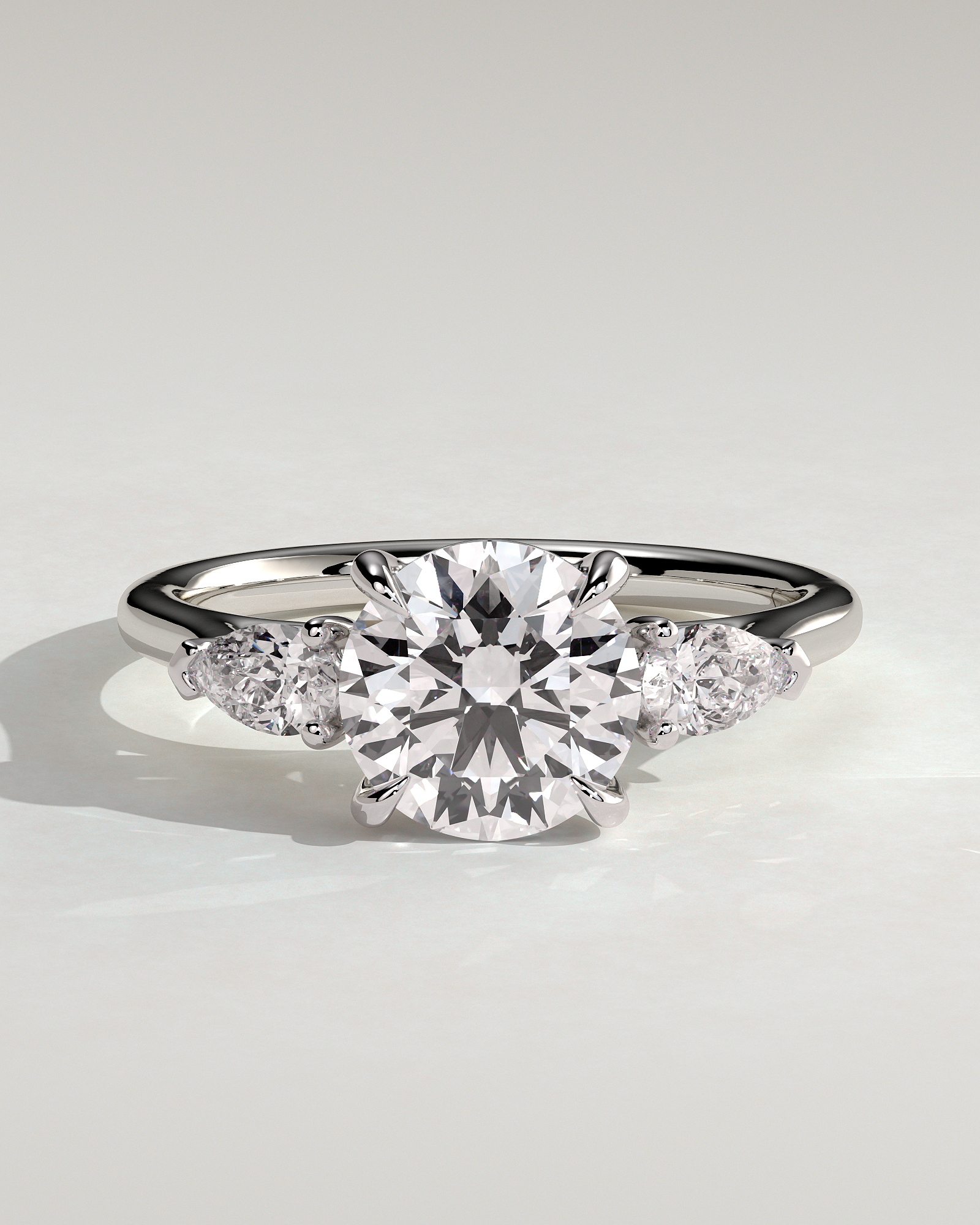 Arya - Round Trilogy with Pear Side Stones - 18k White Gold