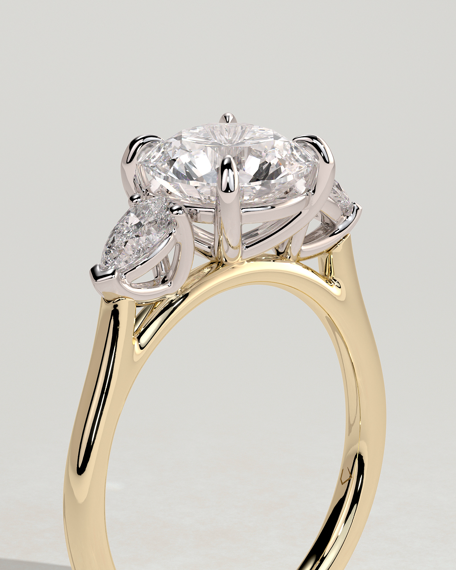 Arya - Round Trilogy with Pear Side Stones - 18k Yellow Gold / 18k White Gold