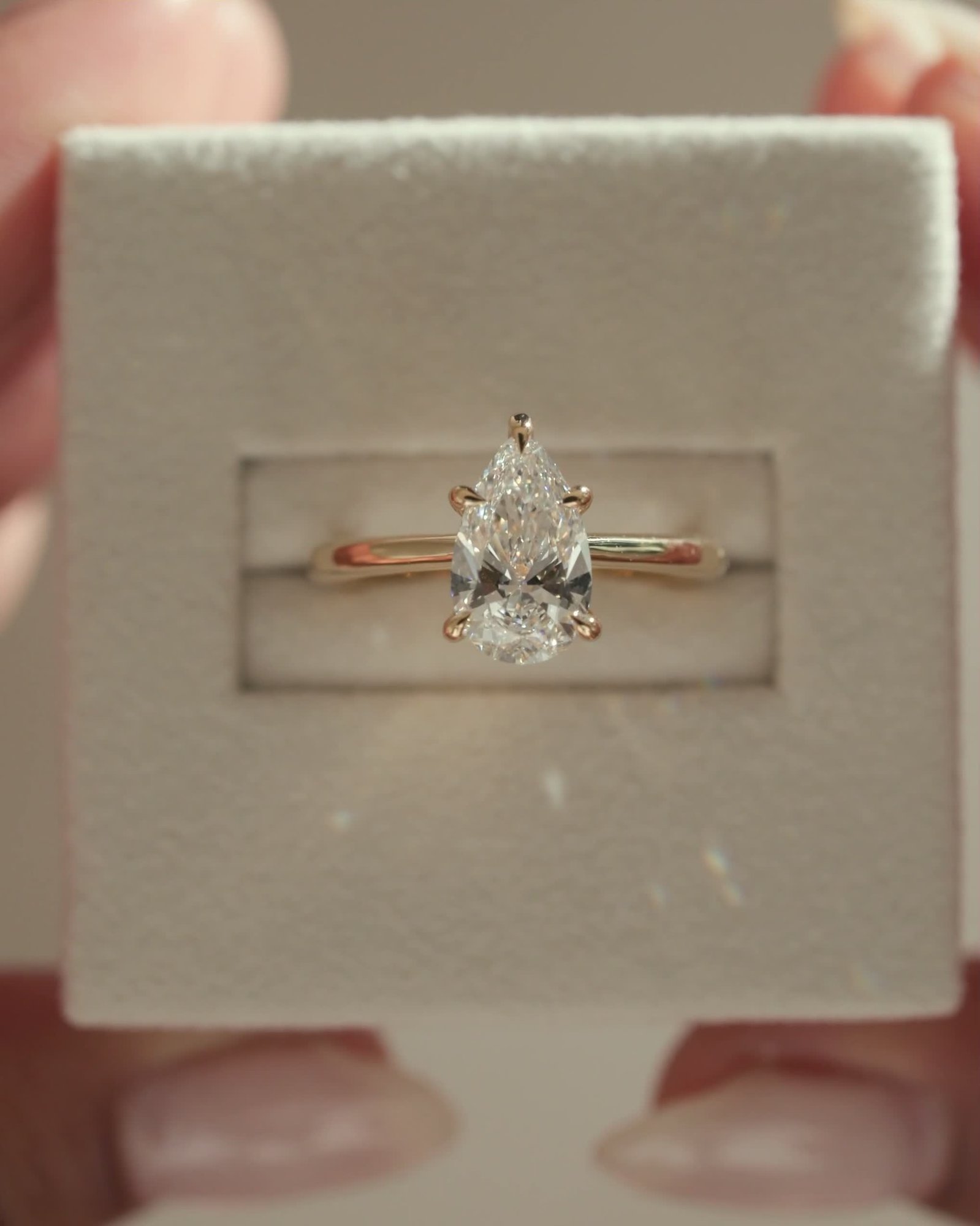 Aspen  5 Claw Pear Solitaire Lifestyle Image