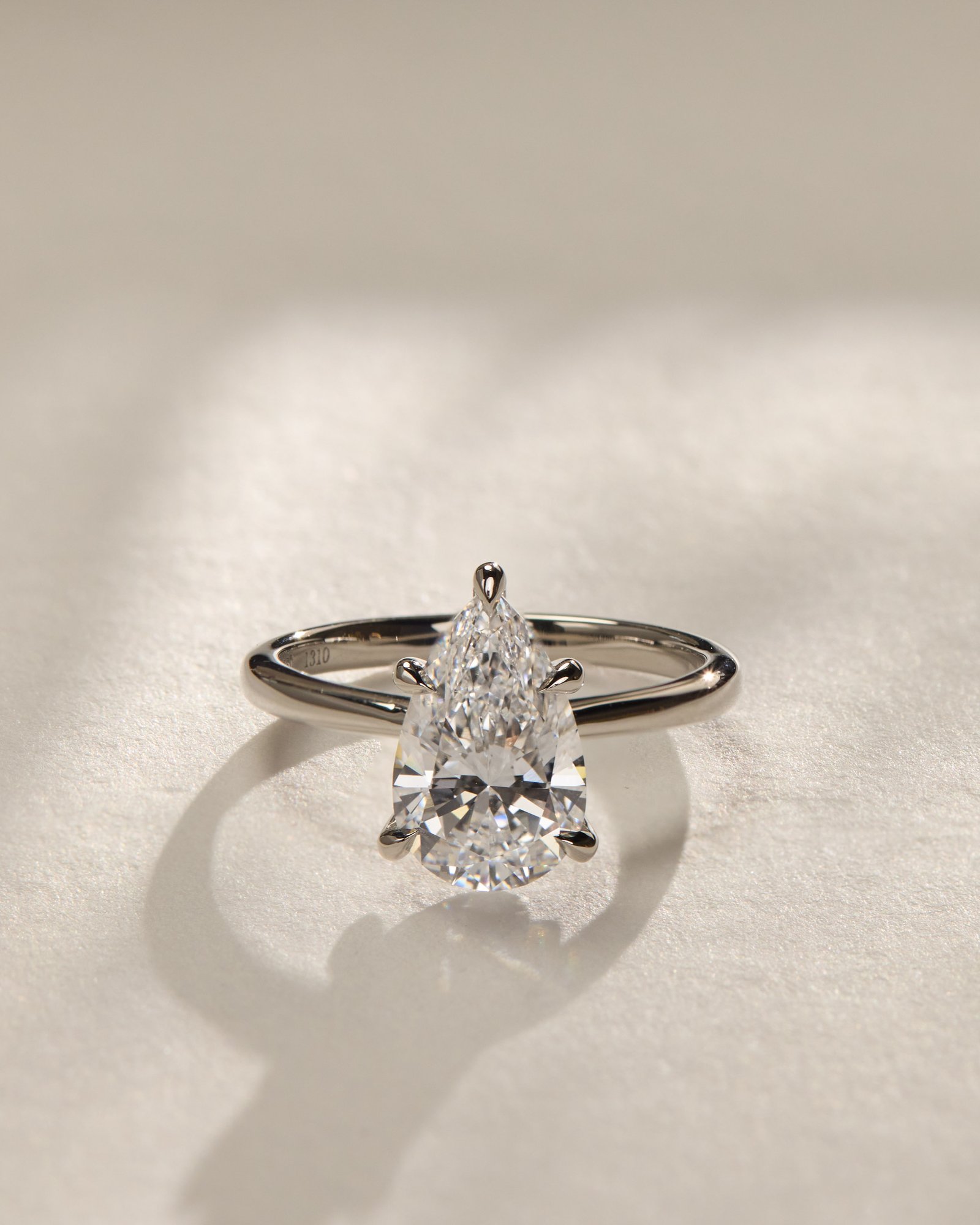 Aspen  5 Claw Pear Solitaire Lifestyle Image