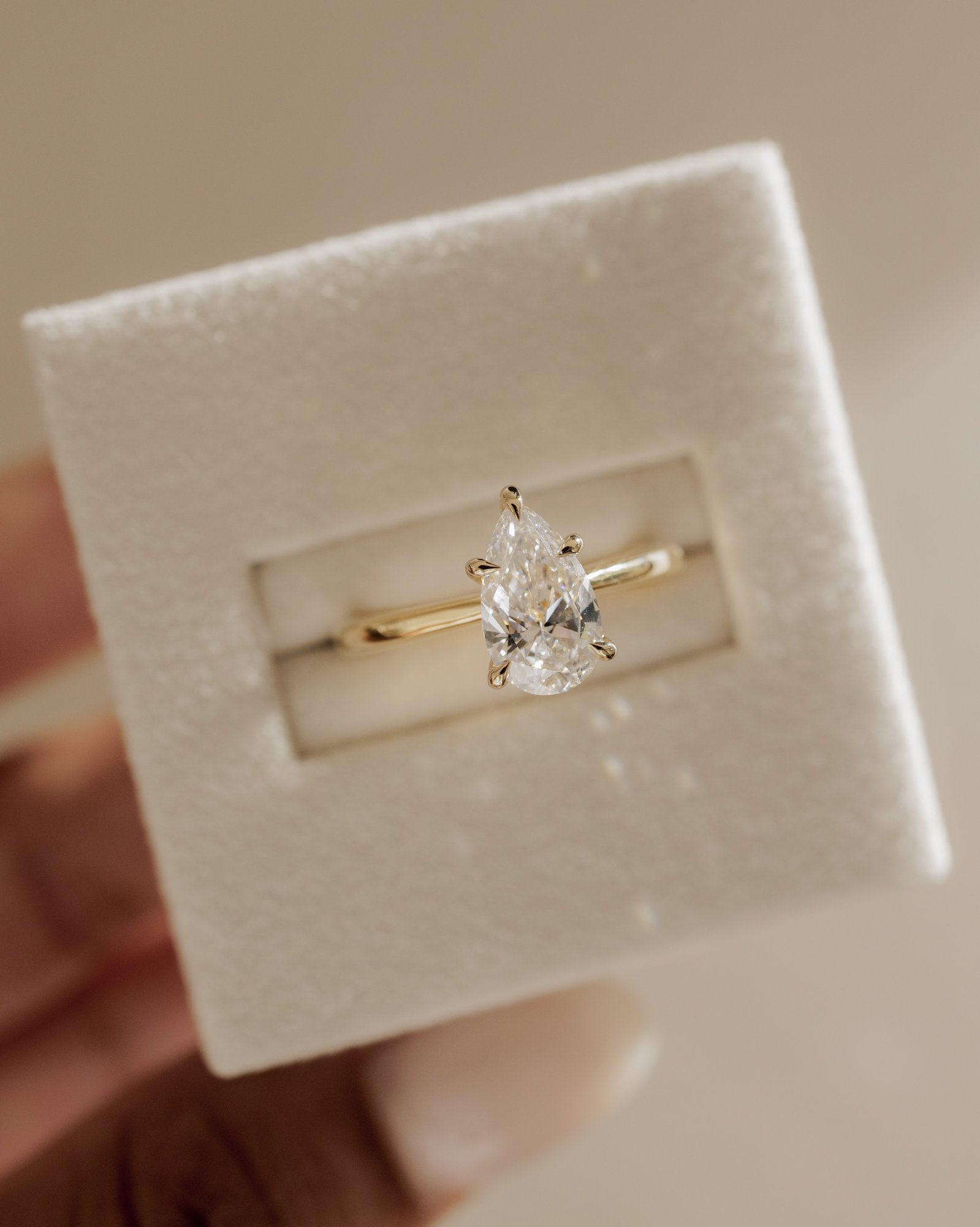 Aspen  5 Claw Pear Solitaire Lifestyle Image