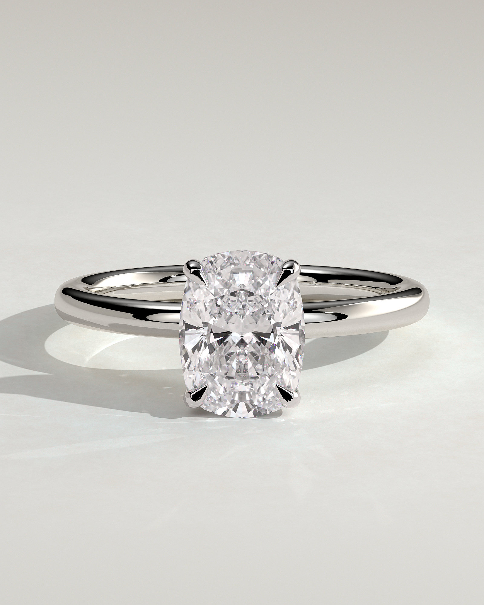 Ava - Elongated Cushion 4 Claw Solitaire with Hidden Halo Engagement Ring - 18k White Gold High Setting