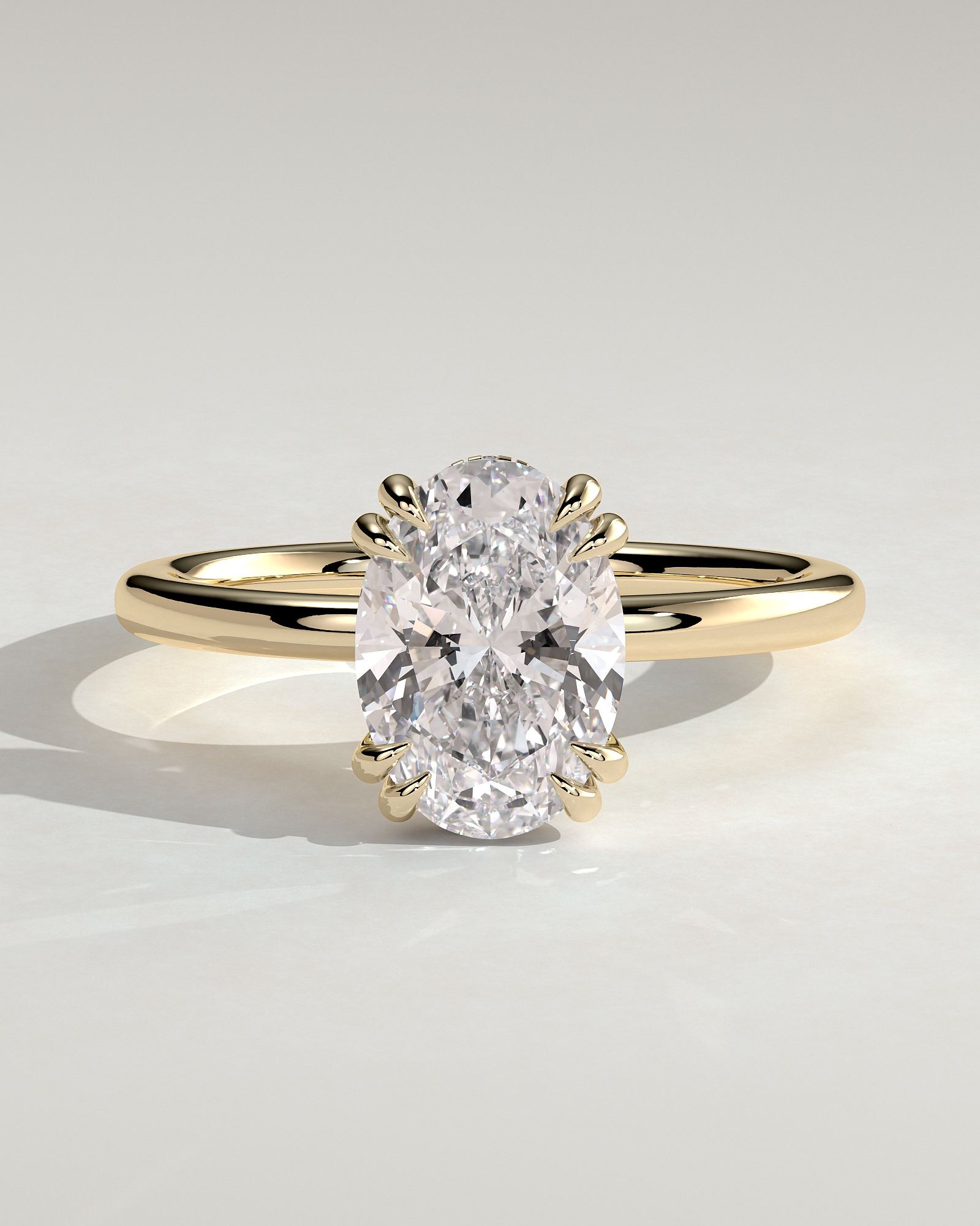 Avery - Oval 4 Double Claw Solitaire with Hidden Halo Engagement Ring - 18k Yellow Gold High Setting