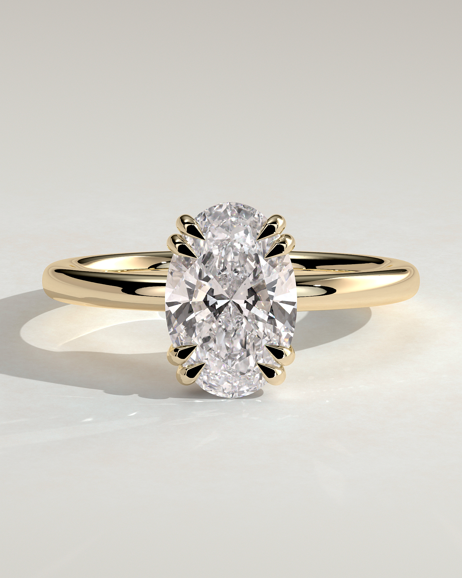 Avery  Double Tipped 4 Claw Oval Solitaire - 18k Yellow Gold