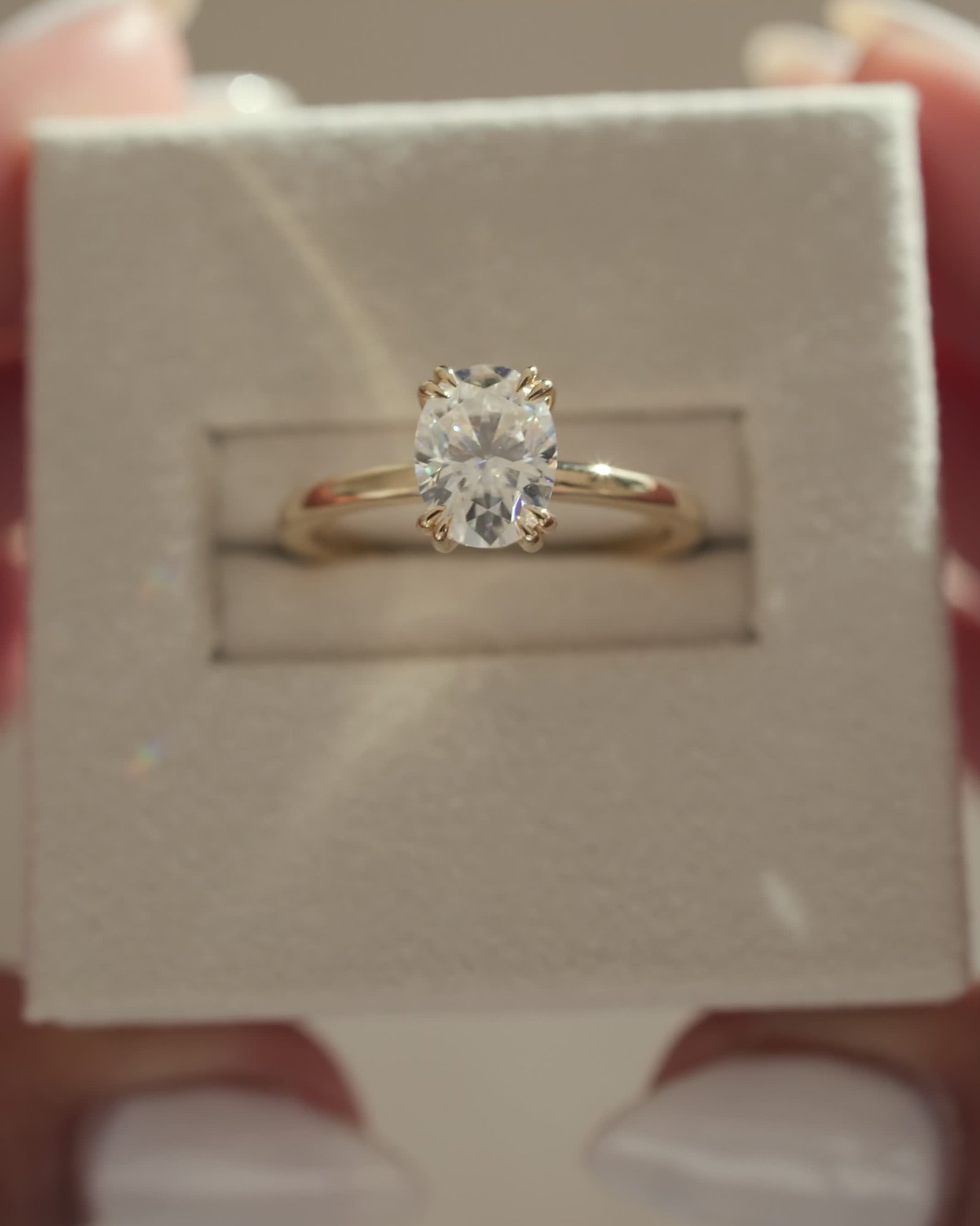 Avery  Double Tipped 4 Claw Oval Solitaire Lifestyle Image