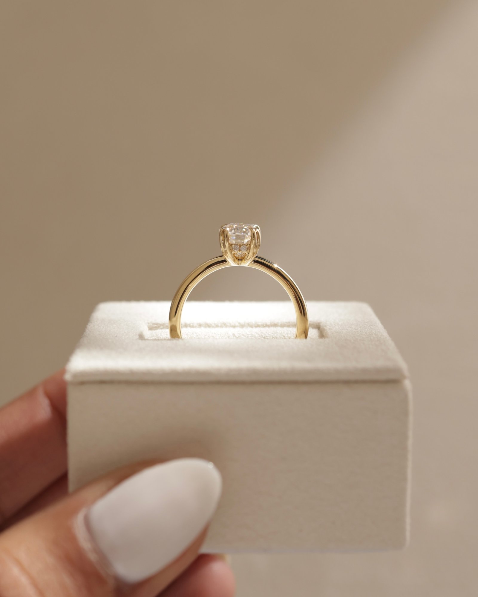 Avery  Double Tipped 4 Claw Oval Solitaire Lifestyle Image