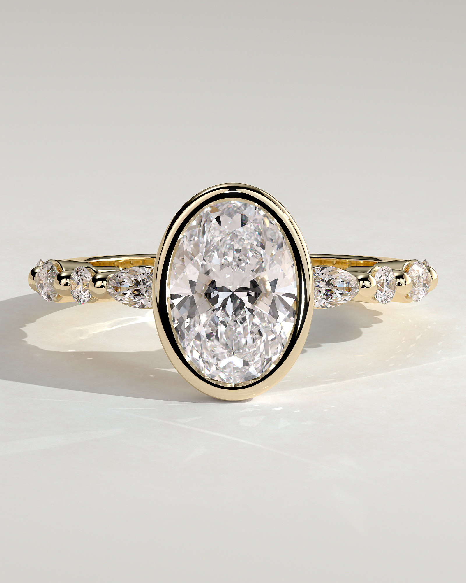 Aylin - Bezel Set Oval with Accent Stones - 18k Yellow Gold
