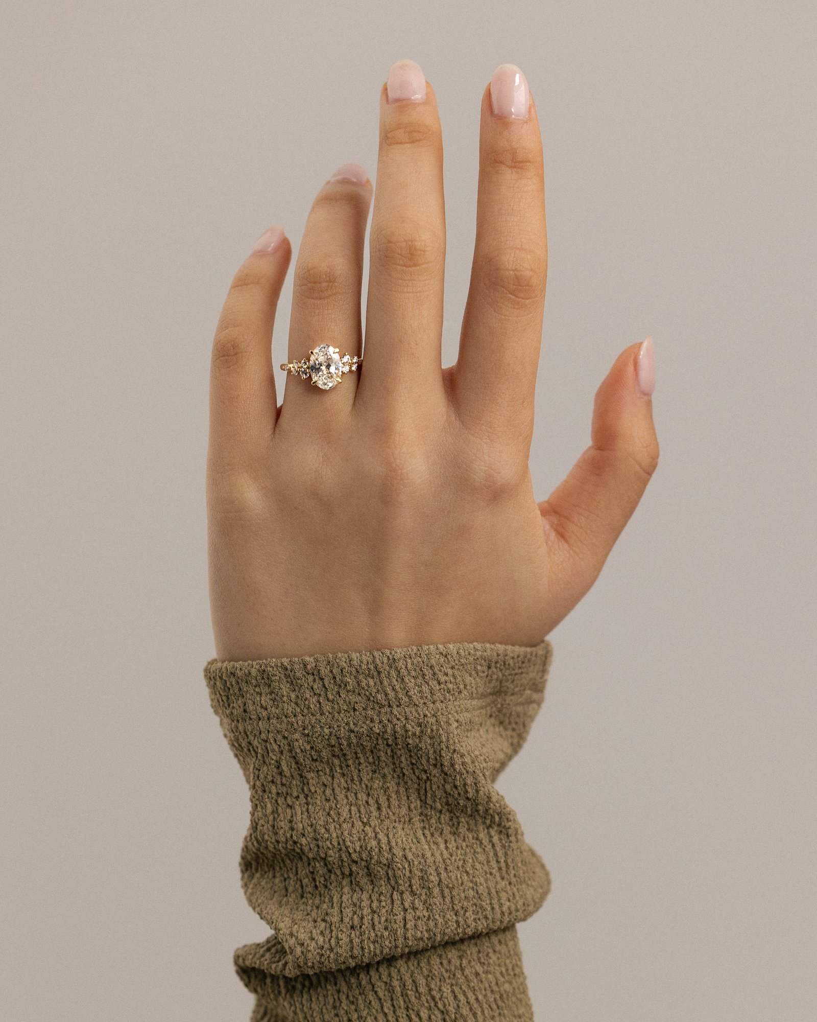 Bella  Oval Solitaire with Accent Stones Lifestyle Image