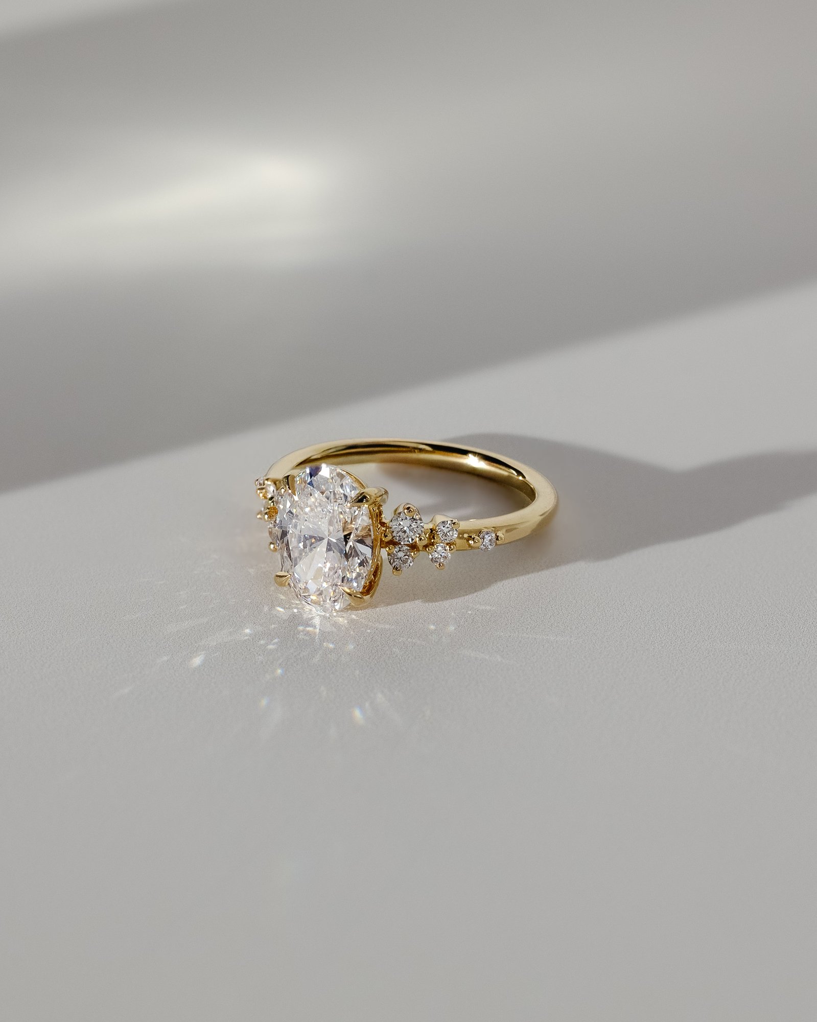 Bella  Oval Solitaire with Accent Stones Lifestyle Image