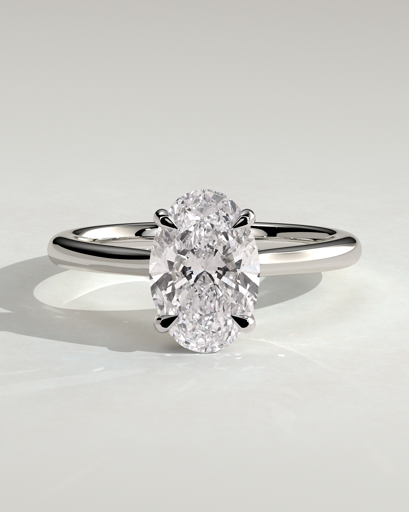 Bethany - Oval 4 Claw Solitaire with Hidden Halo, Tapered Band and Cathedral Setting Engagement Ring - 18k White Gold