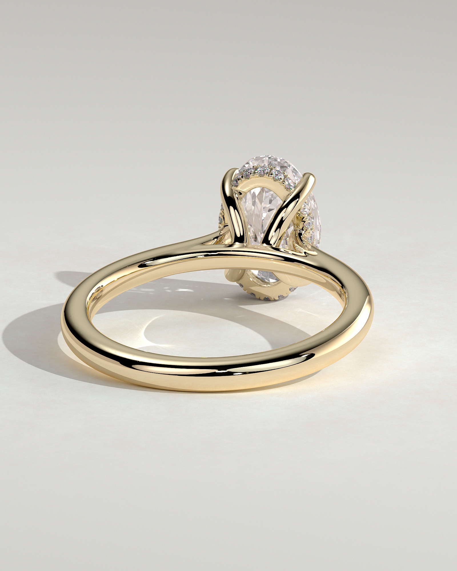 Bethany - Oval 4 Claw Solitaire with Hidden Halo, Tapered Band and Cathedral Setting Engagement Ring - 18k Yellow Gold