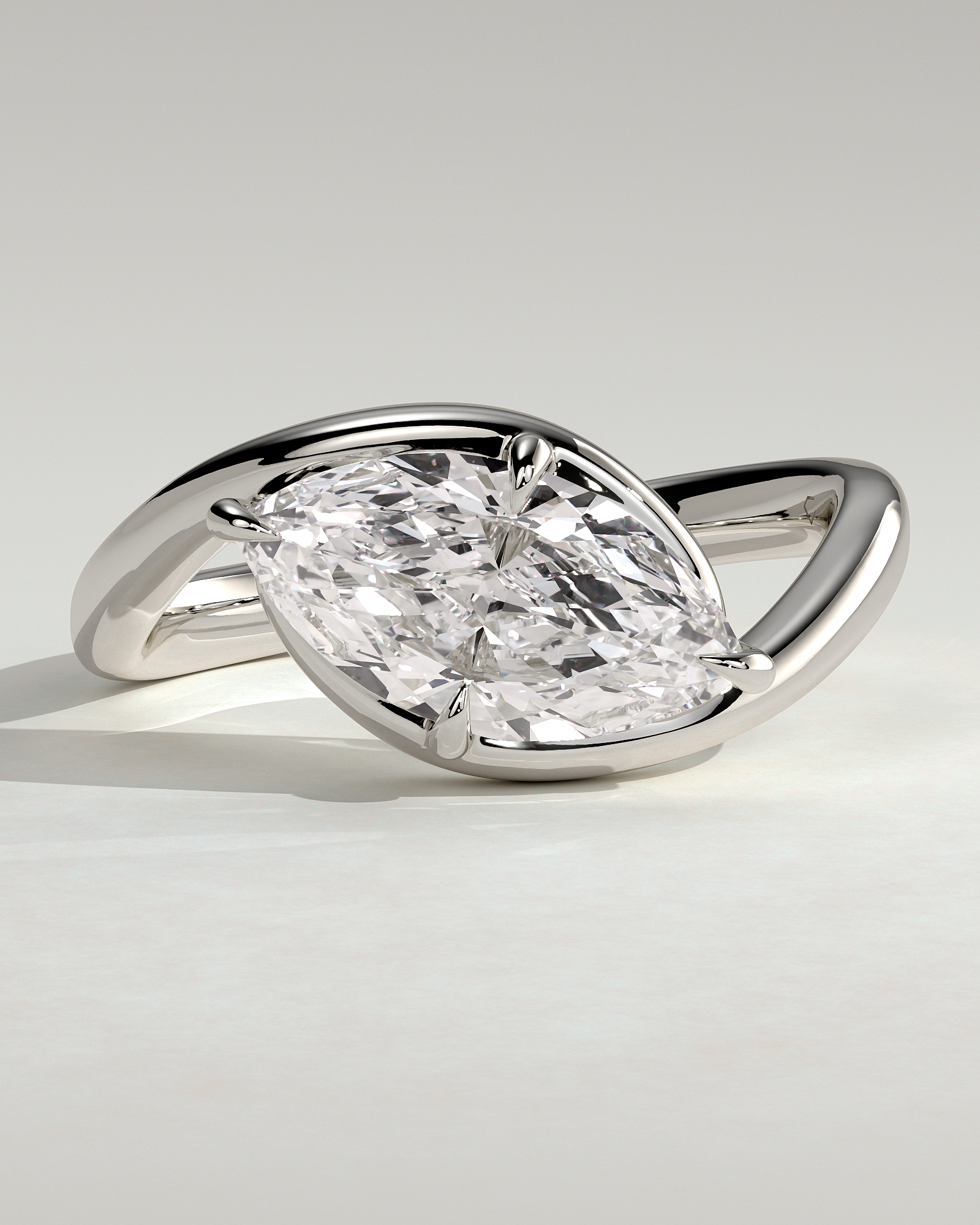 Marquise 4 Claw Solitaire with Bypass Band and East West Setting Engagement Ring - 18k White Gold